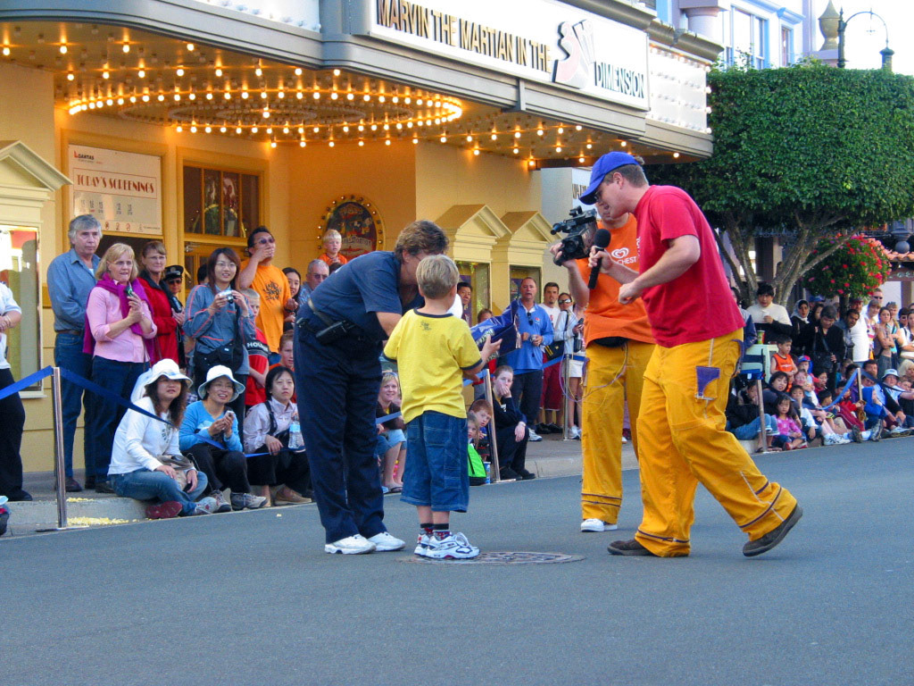 Leigh videotaping a fake ice cream commercial, although the participants thought it was legit