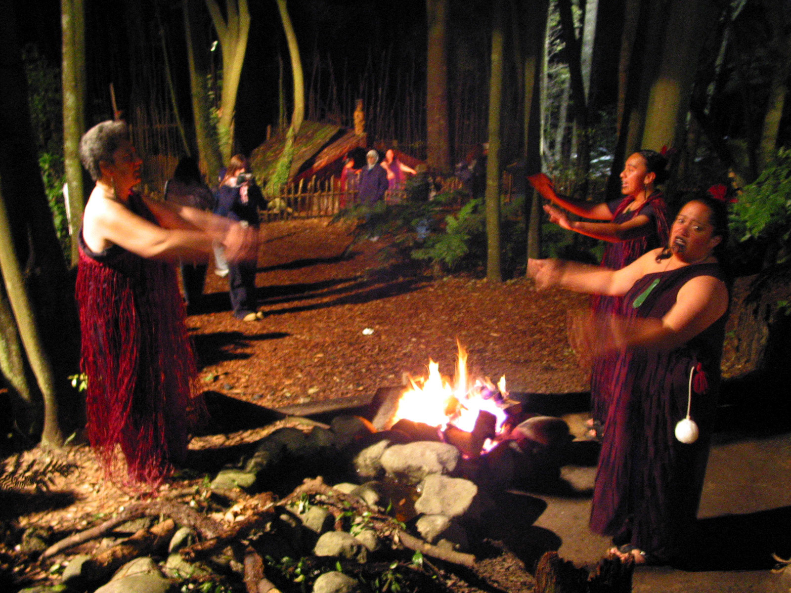 Mauri women sing and dance around the fire