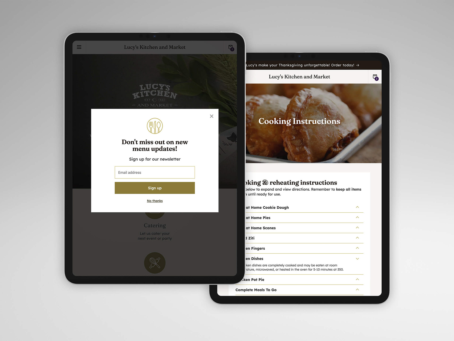Two tablets showing screenshots of lucystogo.com
