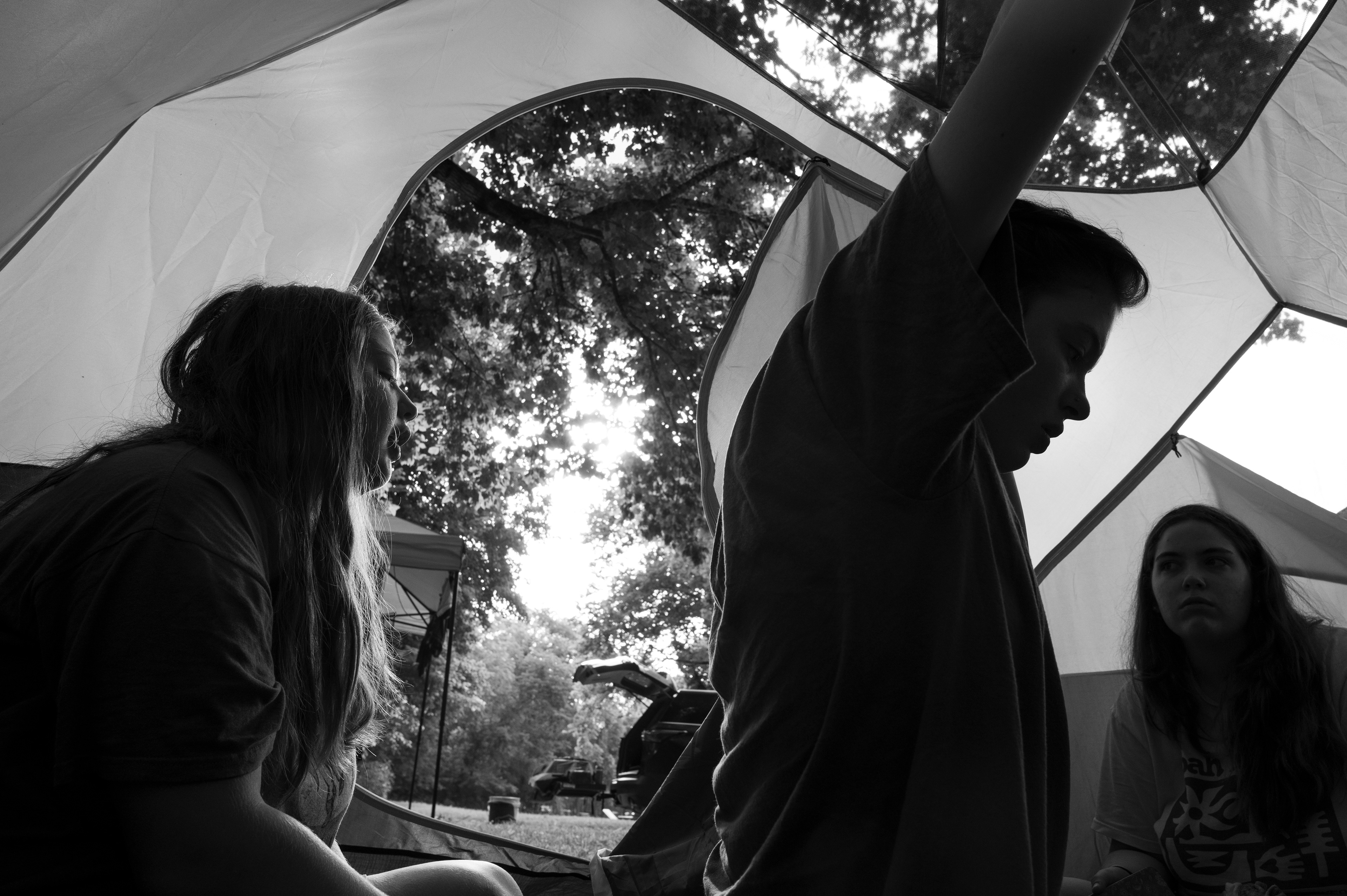Campers Greta, Jayme, and Caroline wake and get ready for the day ahead.