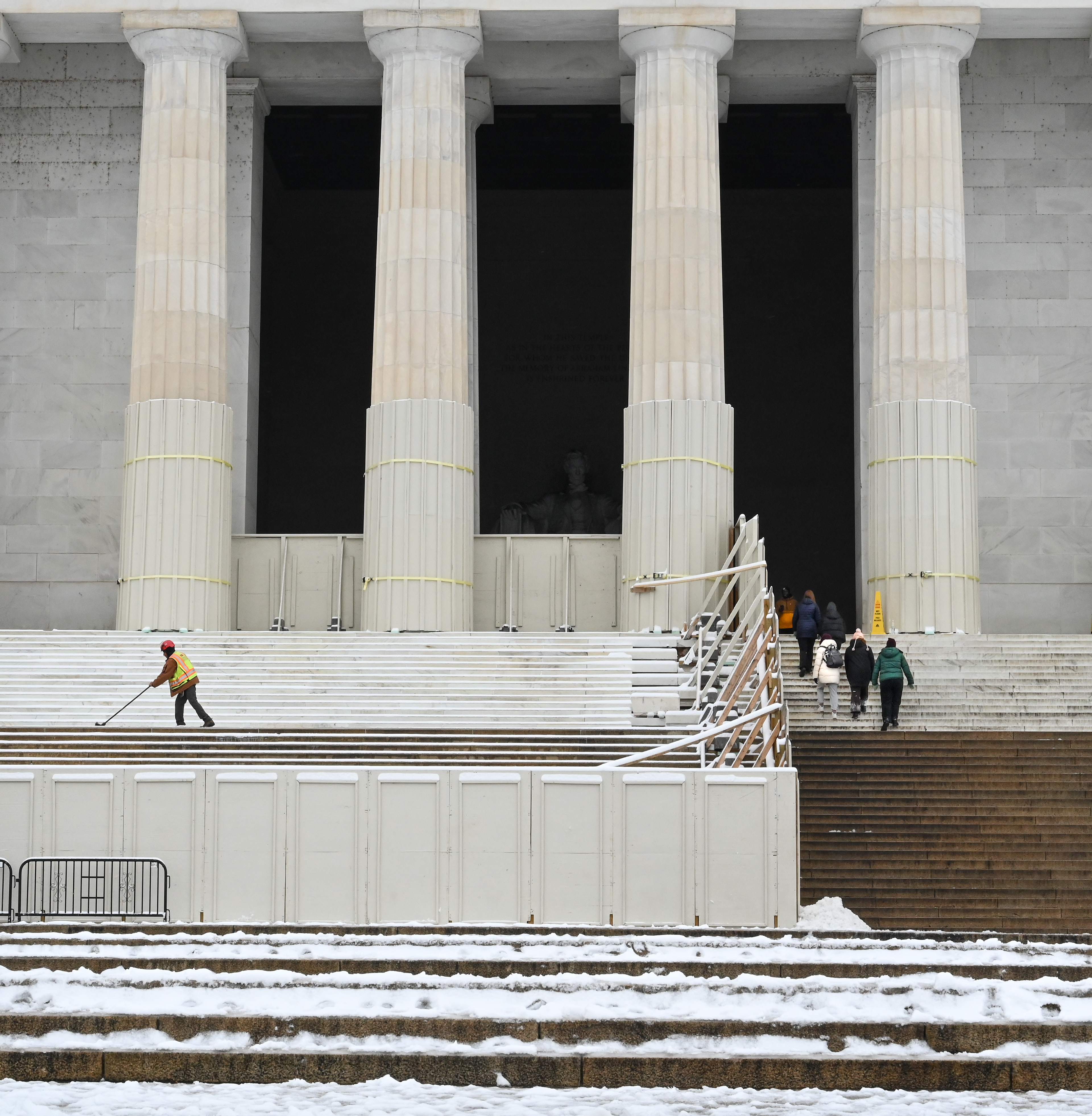 Two different experiences on a rare snowy day at the Lincoln Memorial.