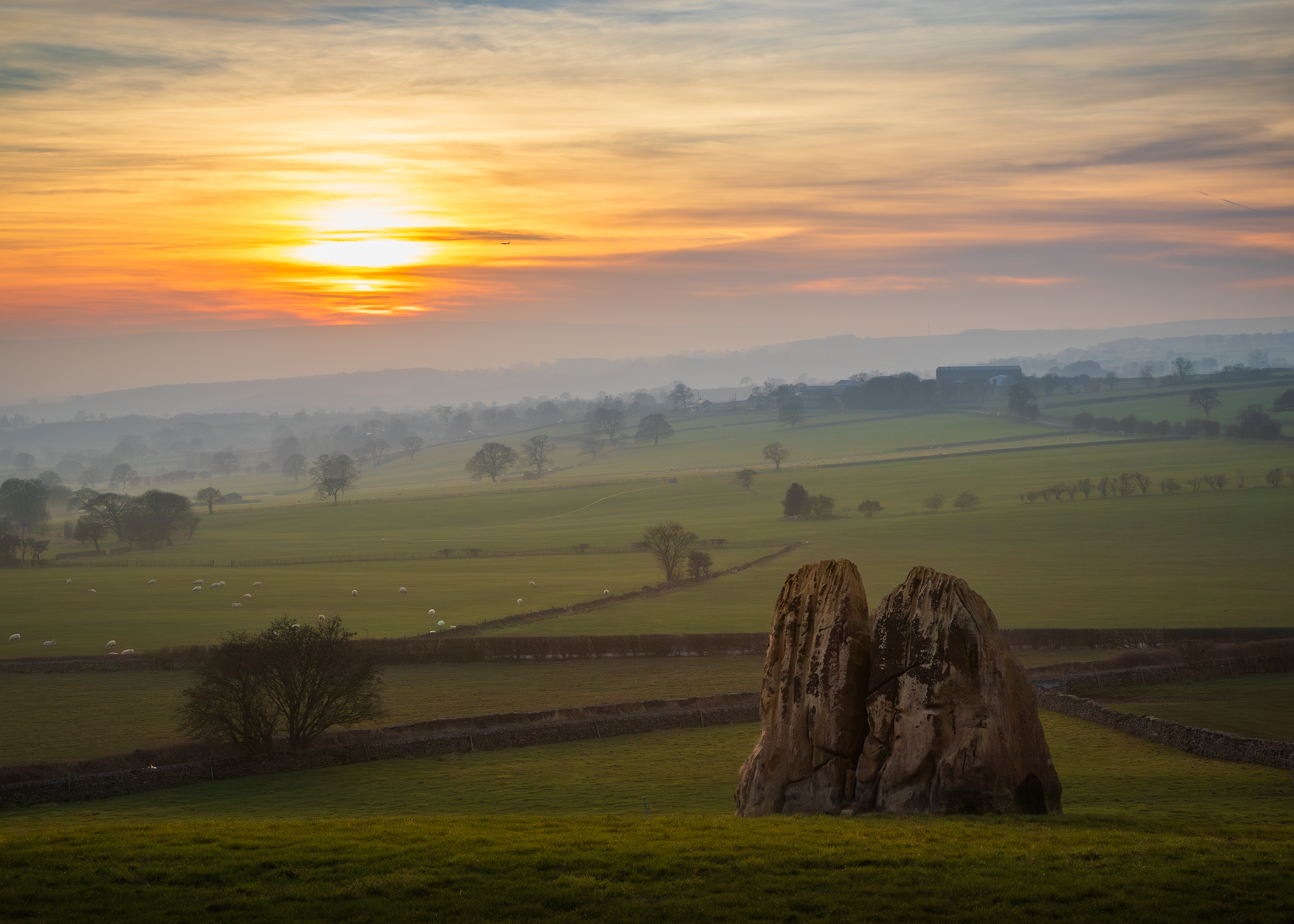 moody sunset with trousers boulder
