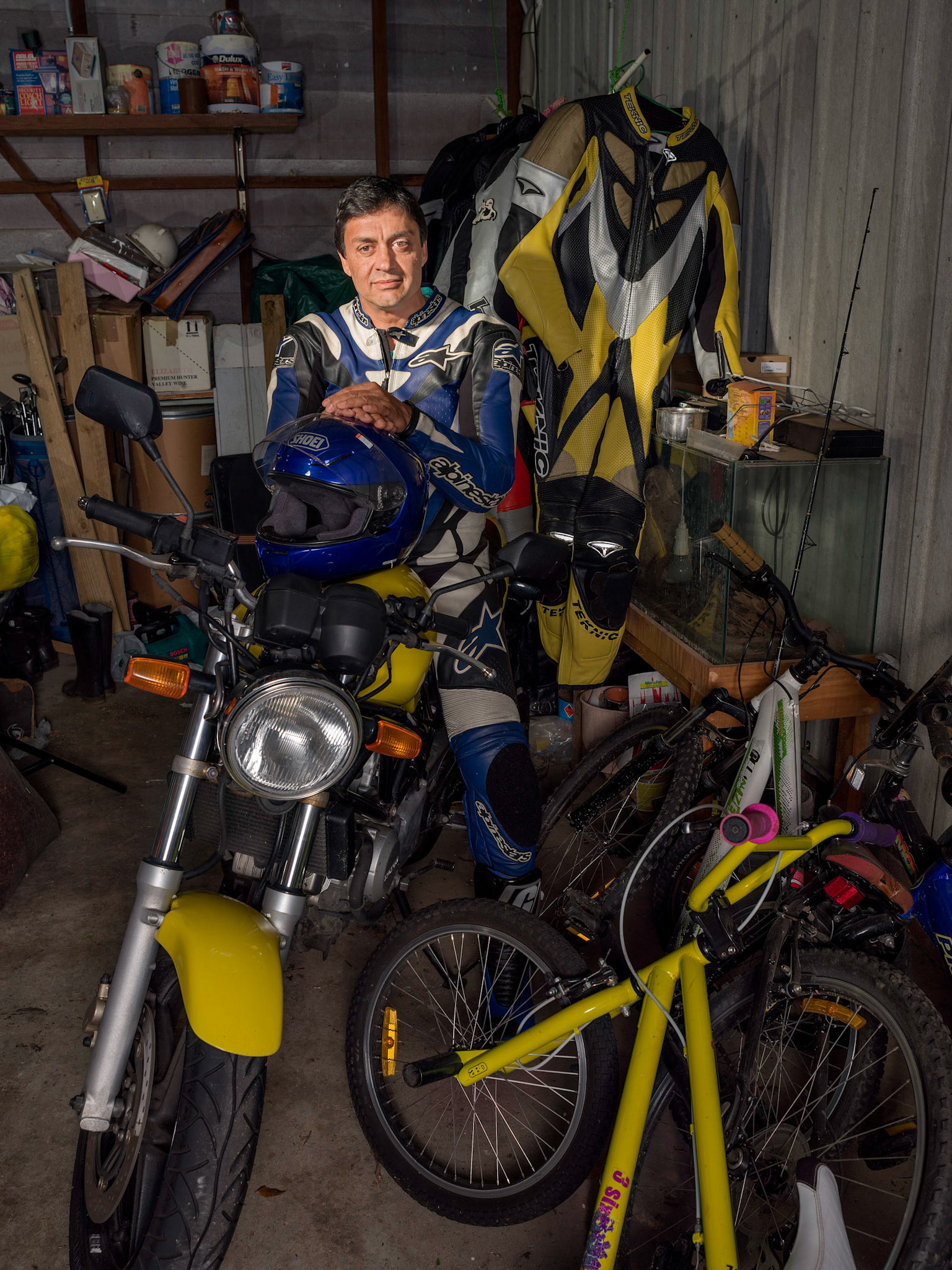 Colyn is a motorcycle enthusiast and has been for years, as you can see by the collection of leathers behind him.