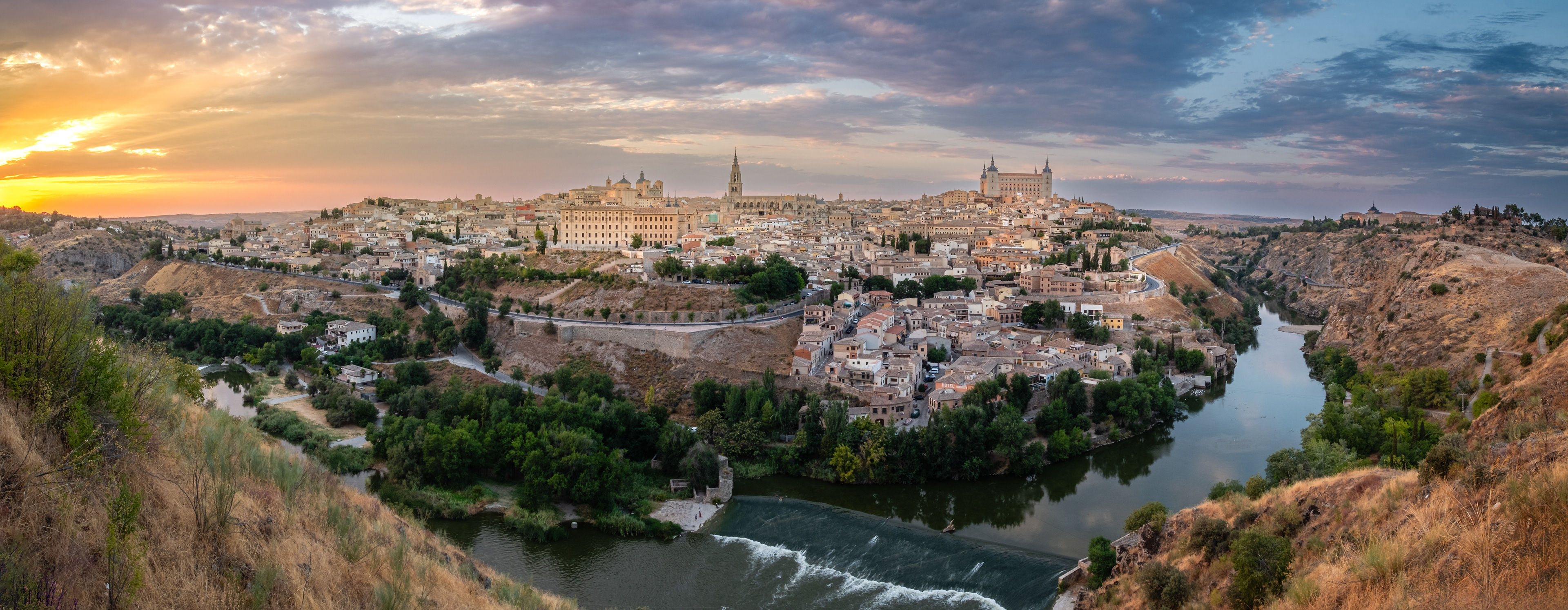 Toledo - Panoramic view of a sunset over Toledo, Spain seen from the Mirador del Valle overlook. Awesome city to visit!
