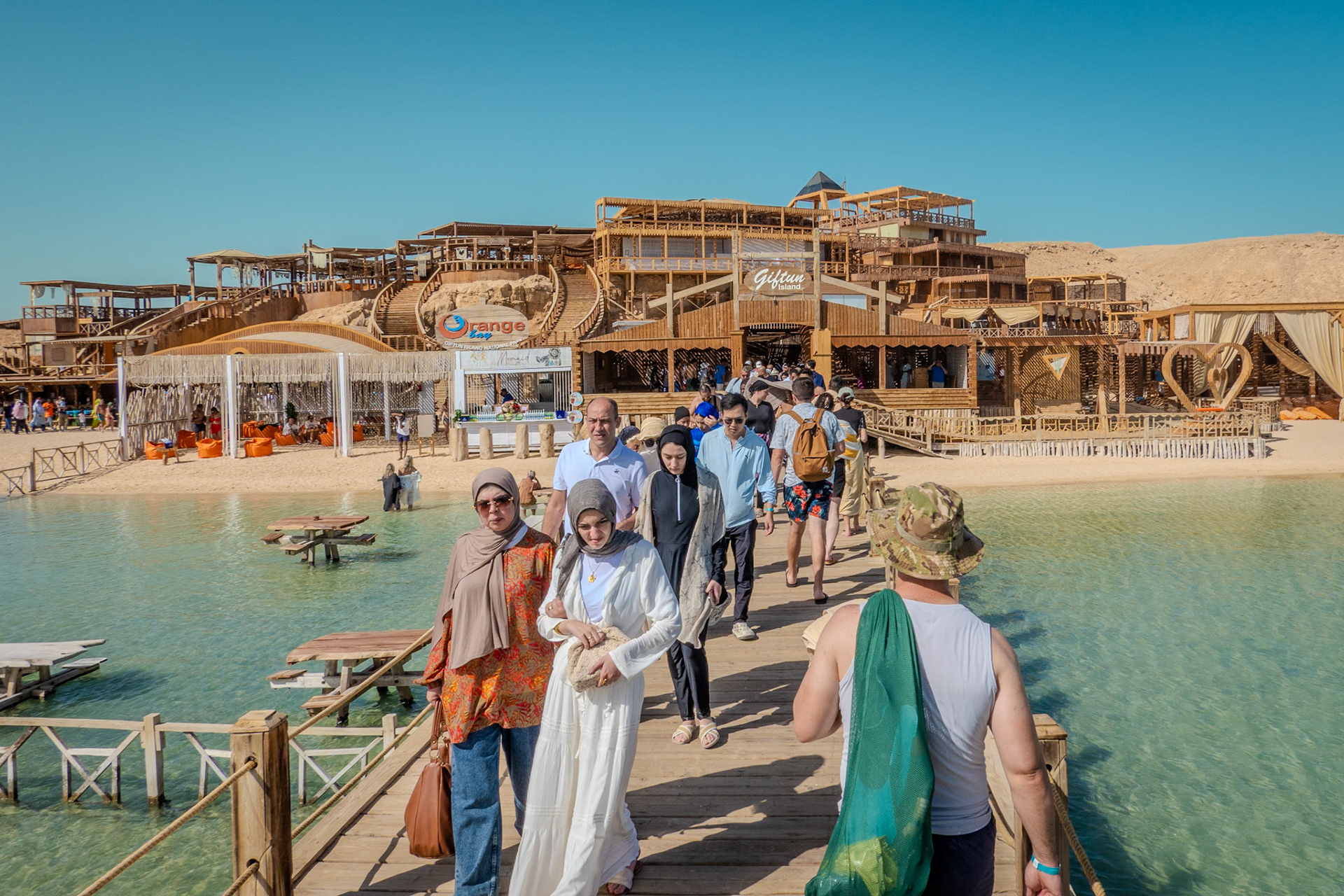 Tourists leaving Orange Bay on Giftun Island in the Red Sea