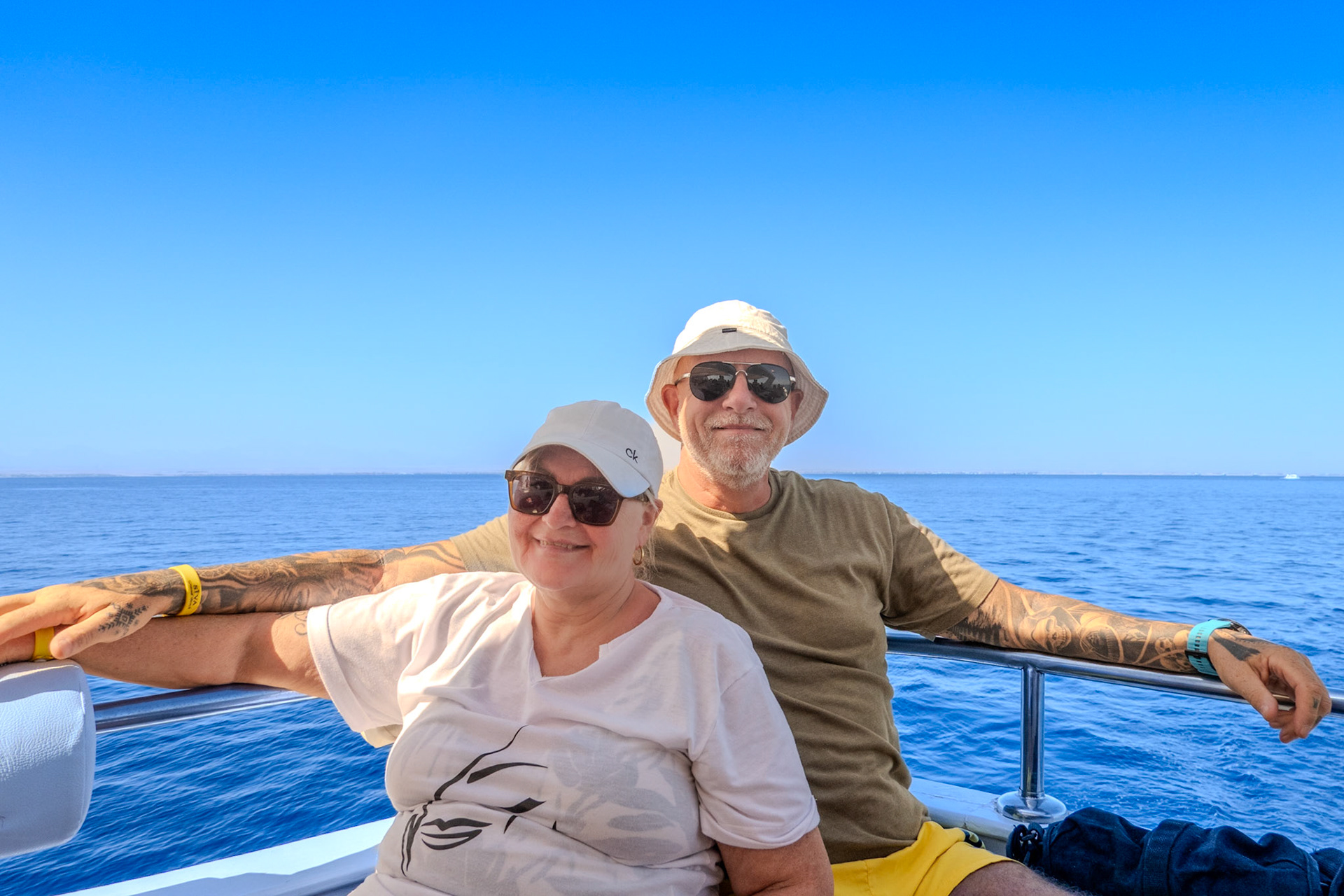 Couple smiling on a boat in the Red Sea