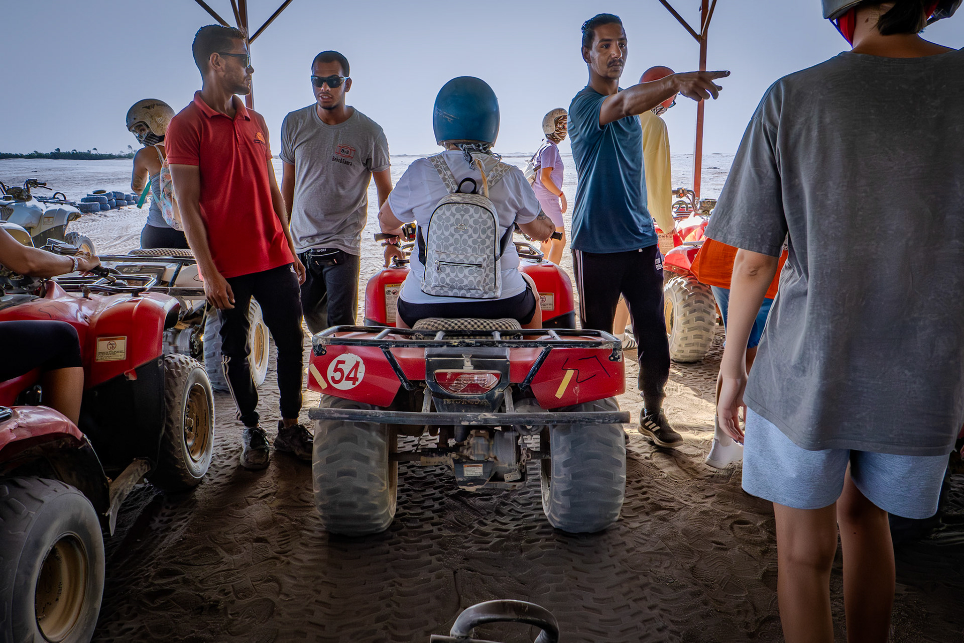 Lady from sitting a quad bike