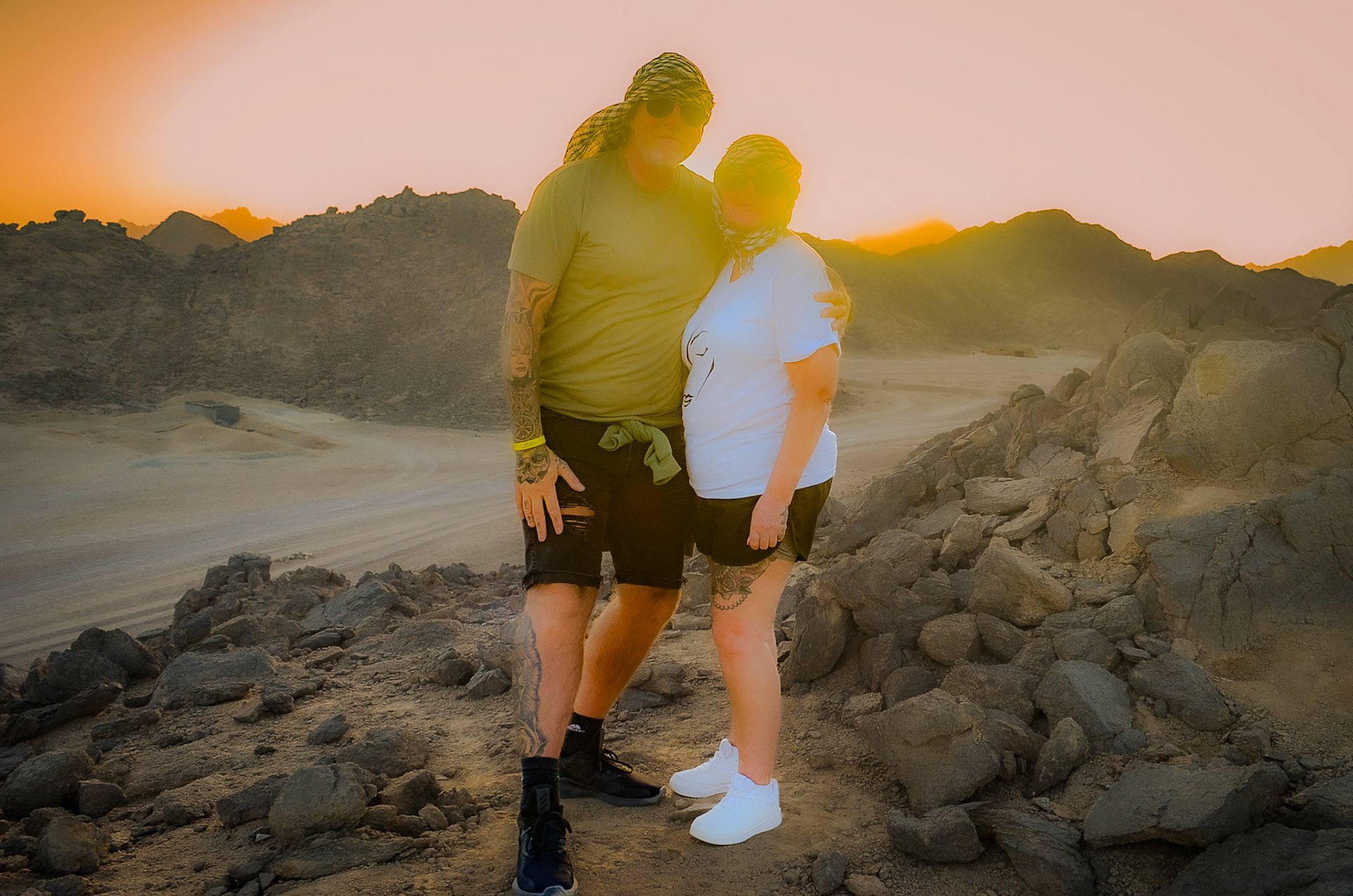 Couple in a loving embrace in the desert