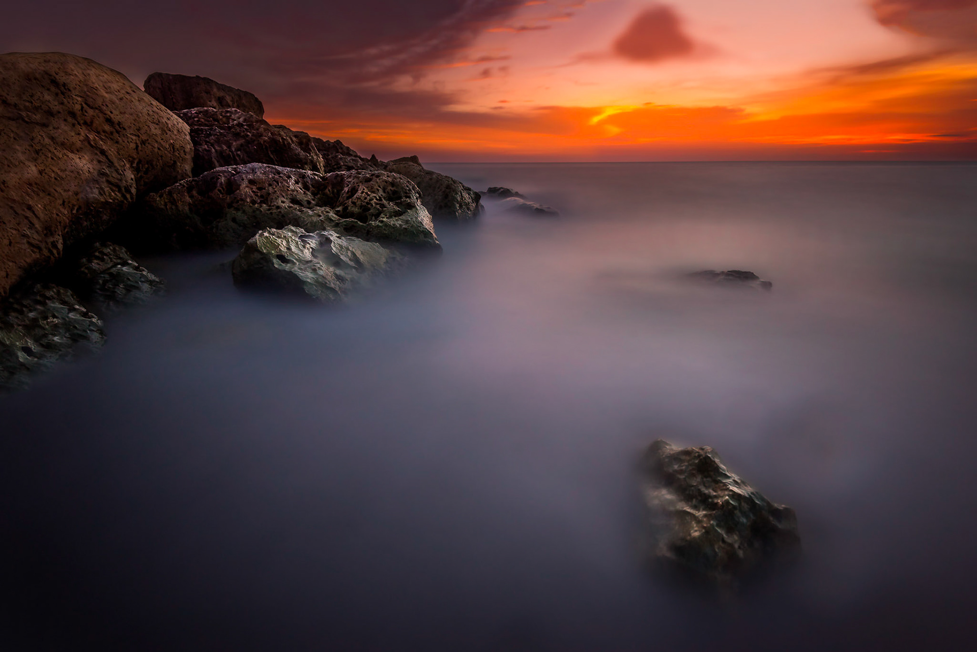 At the very south point of Captiva Island, at the junction with Sanibel Island, Florida, a summer sunset brought colors and tranquility