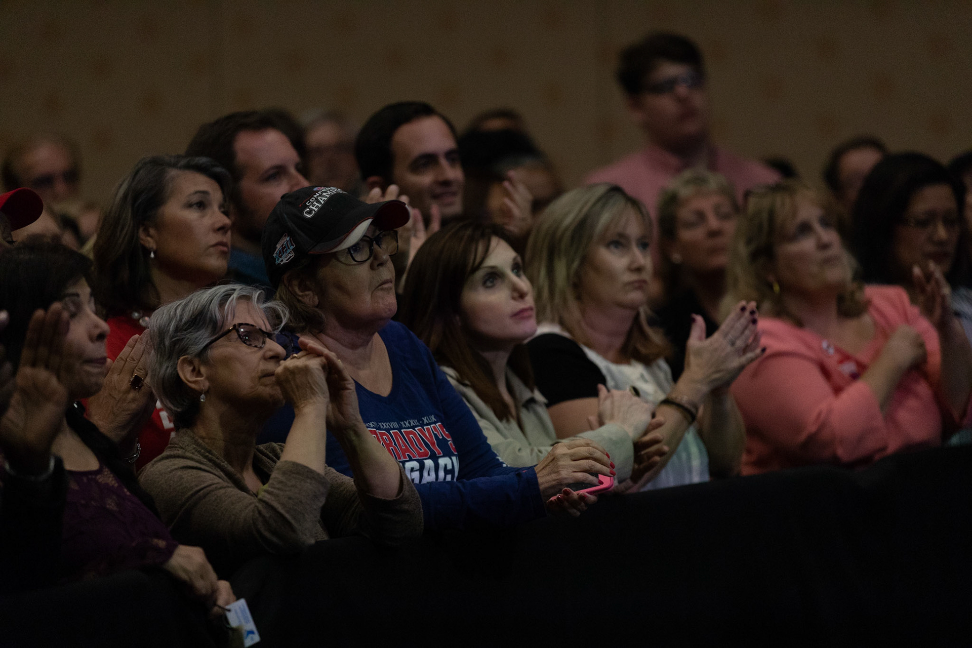 Many in the crowd wore New England Patriots gear to the rally in honor of Sunday football.