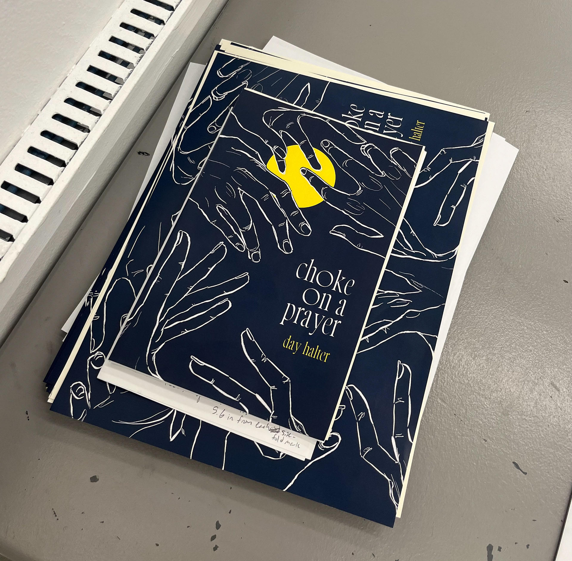 Covers and pages stacked.