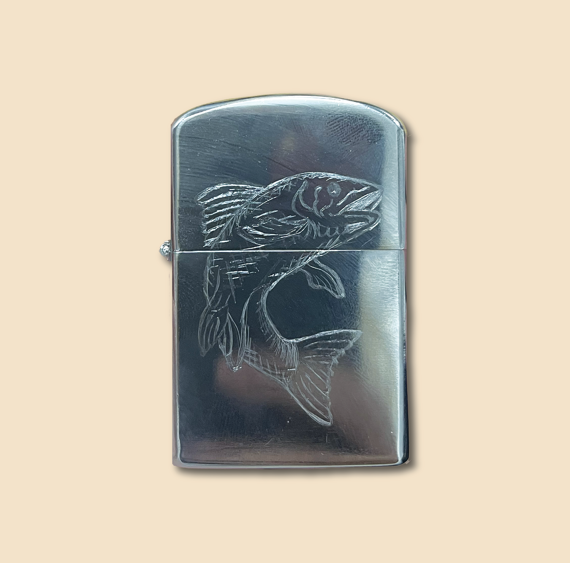Fish hand etched on lighter