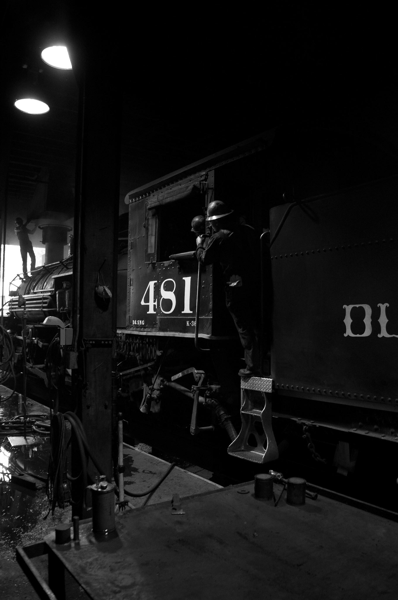 Starting the fire in a K-36; inside the roundhouse at the D&SNGRR