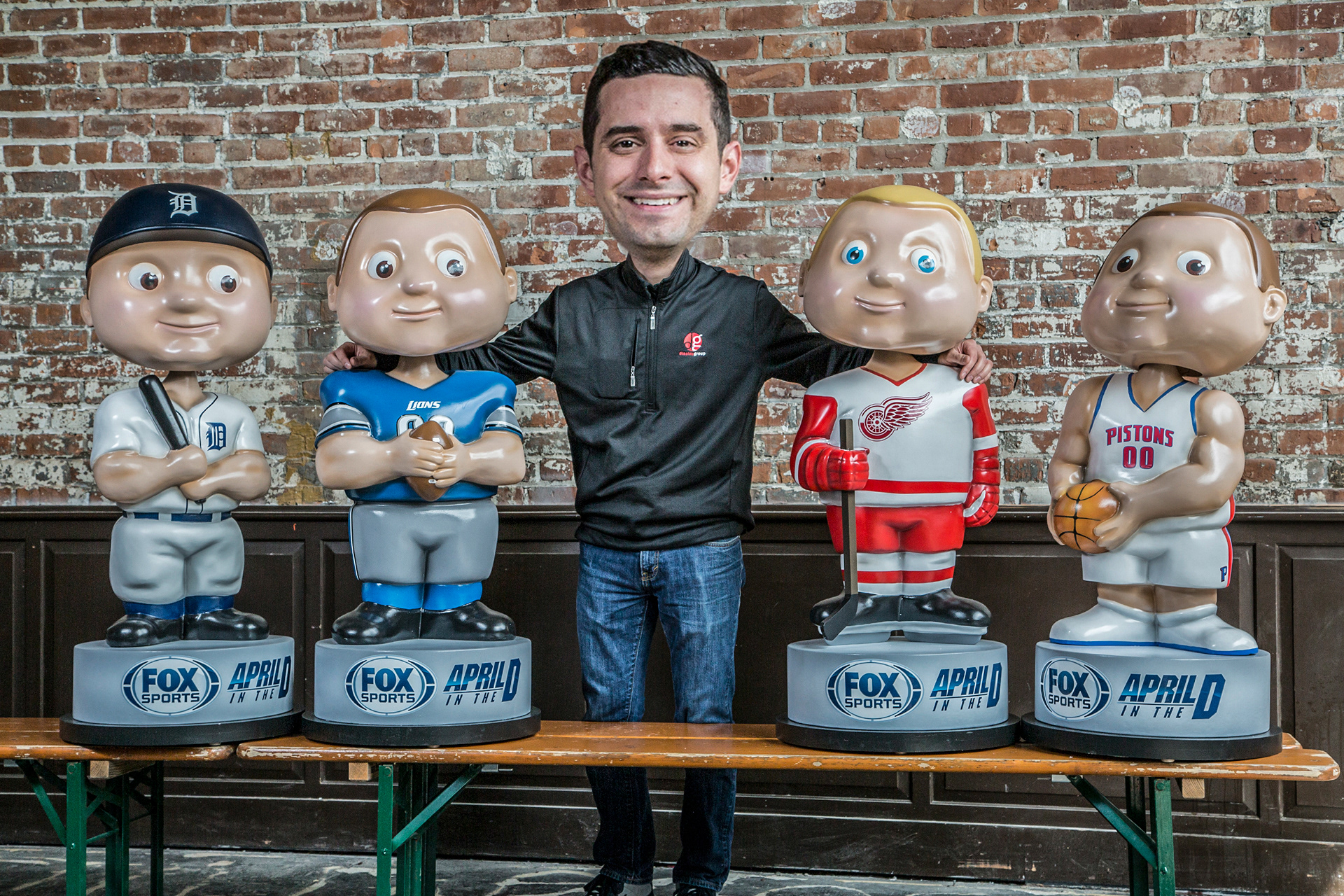 April in the D promo bobbleheads