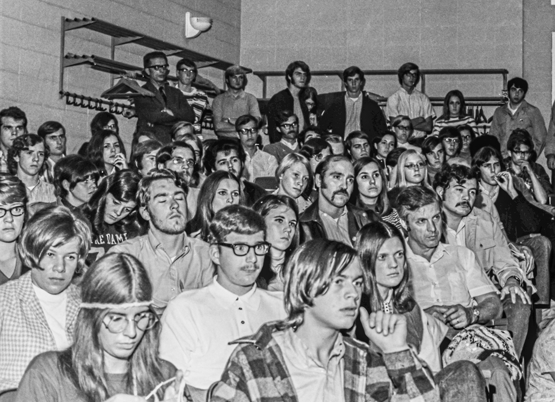 Crowd for an anti-war speaker in a campus lecture hall