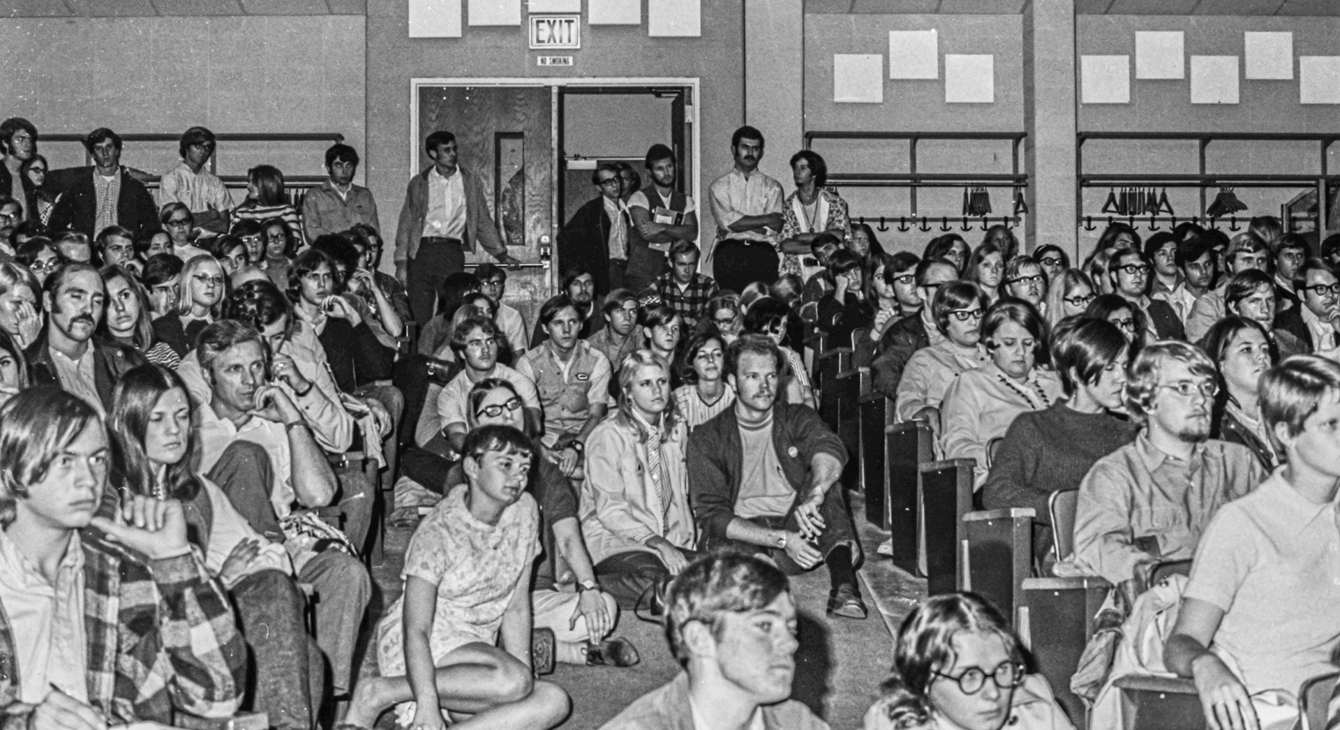 Crowd for an anti-war speaker in a campus lecture hall