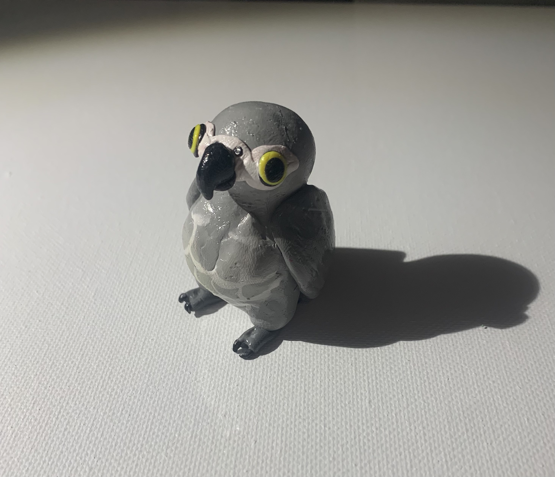African Grey - Clay and Paint, 2" x 2"