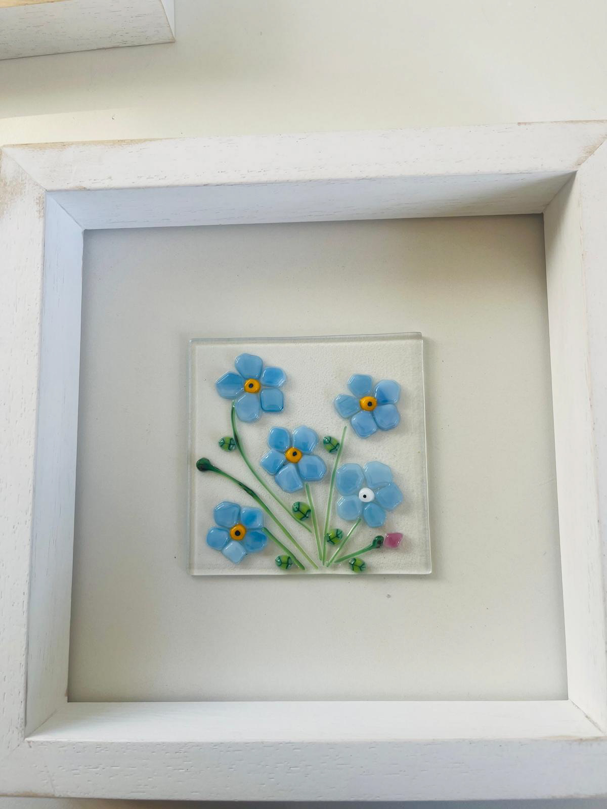 Forget-me-not: Dimensions: Glass 4" x 4", framed 8.5" x 8.5" (handcrafted wooden frame). Price: €45