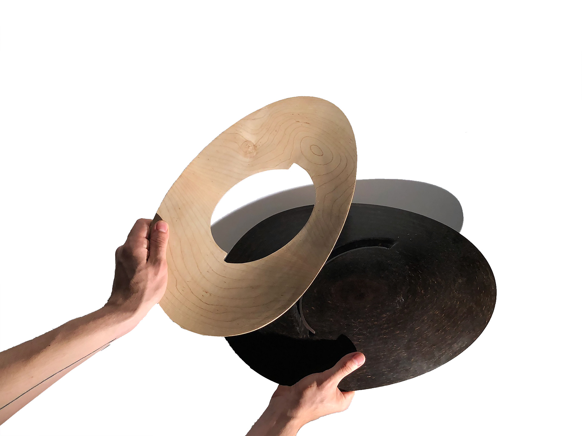 Avocado Bowl created on the CNC that mixes two materials to create a operable co-dependent joint.