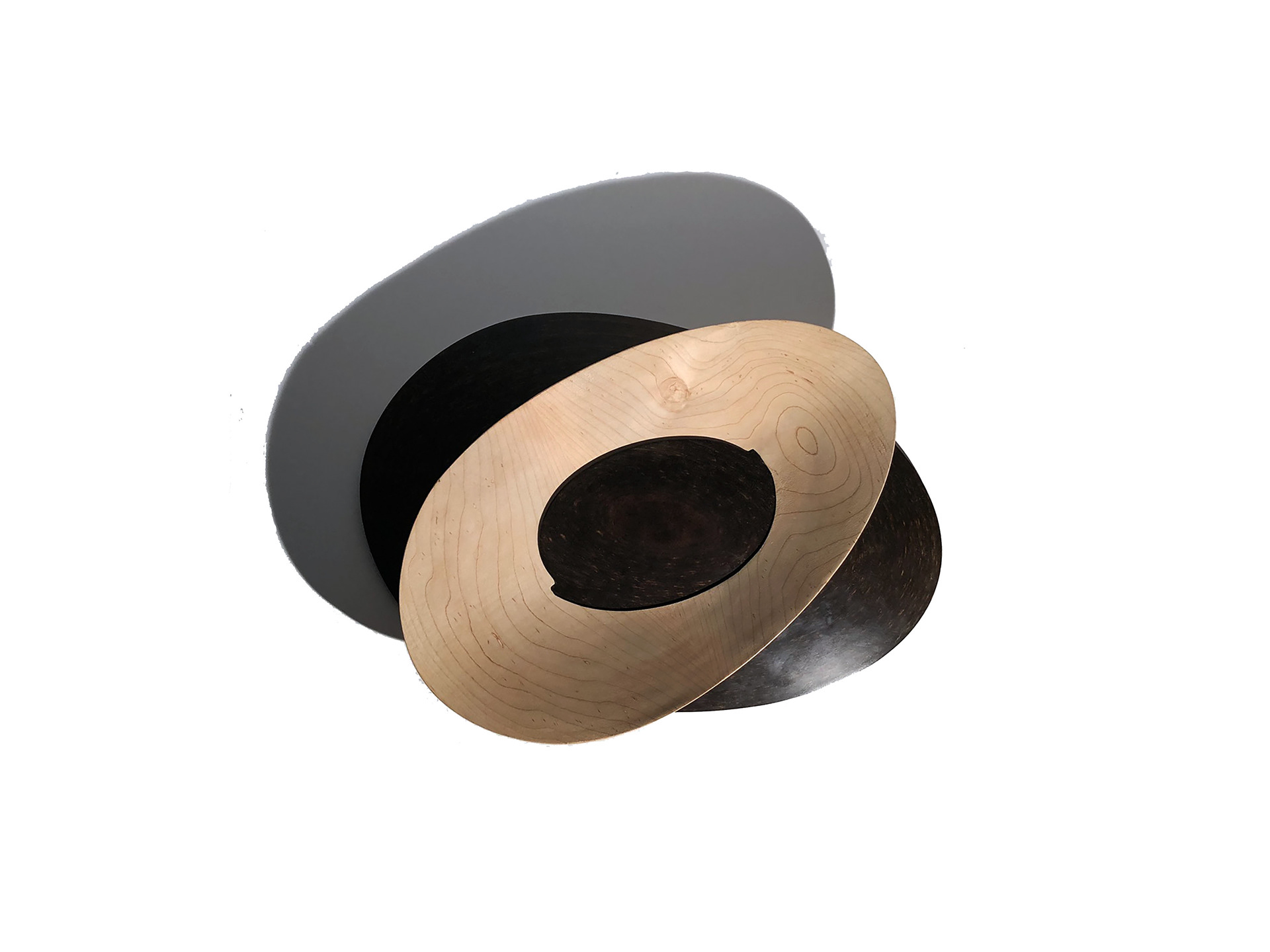 Avocado Bowl created on the CNC that mixes two materials to create a operable co-dependent joint.