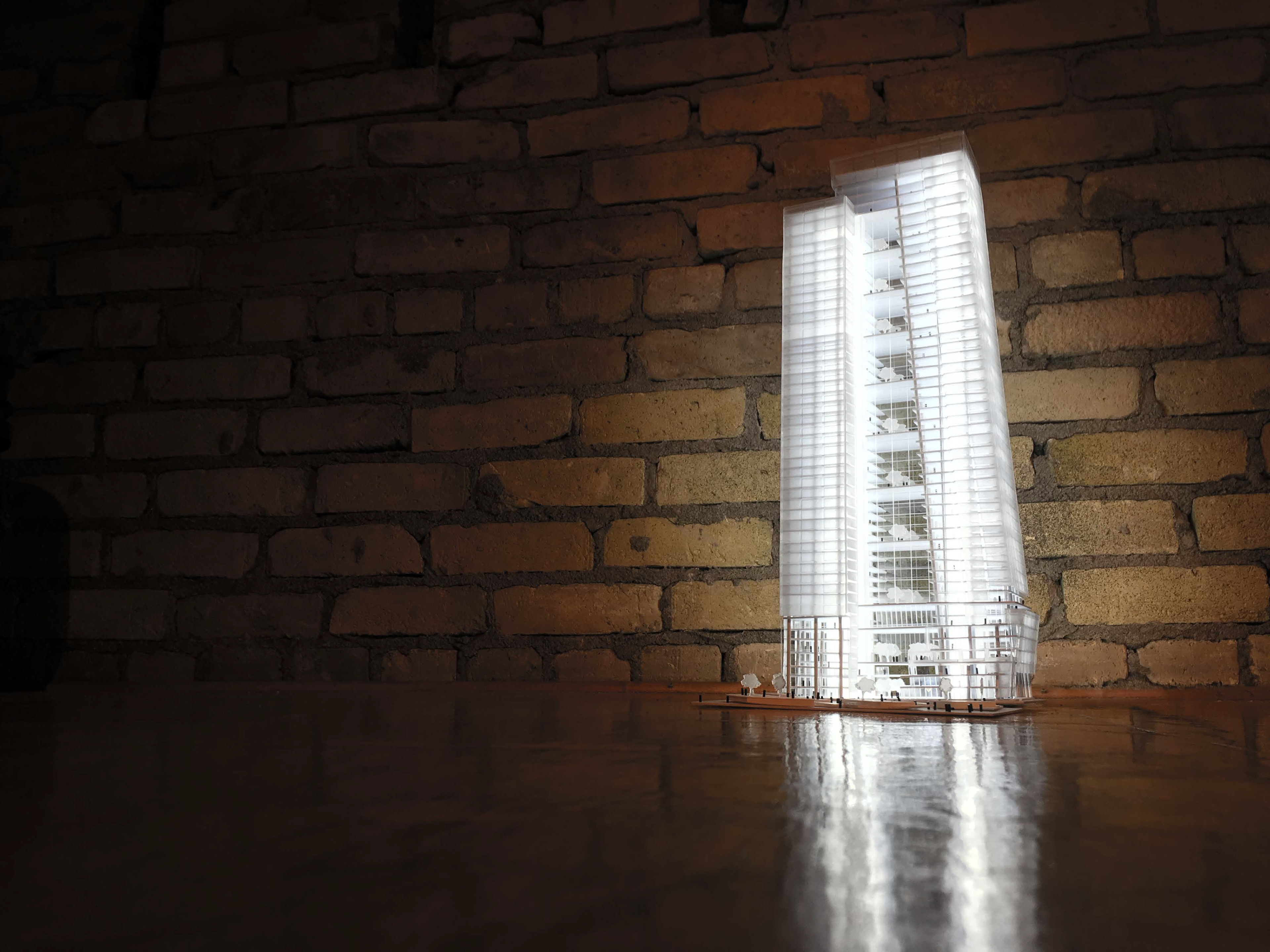 3/32" Acrylic Presentation Model showcasing the facade transparencies and atriums. Laser and raster etched for gradient effect of reflective sawtooth curtain wall.