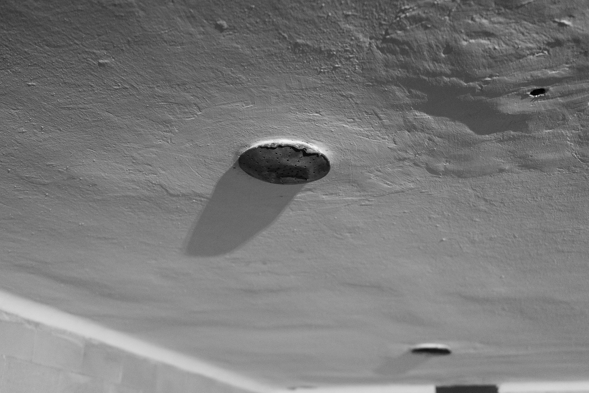 The last original “shower” fixture. The others were stolen.