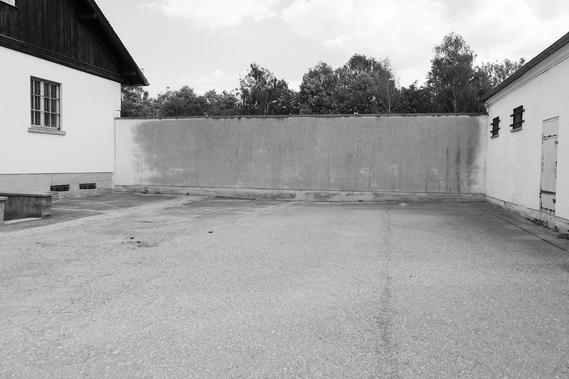 This is the firing wall where executions occurred. Prisoners would be lined up against the wall and shot.