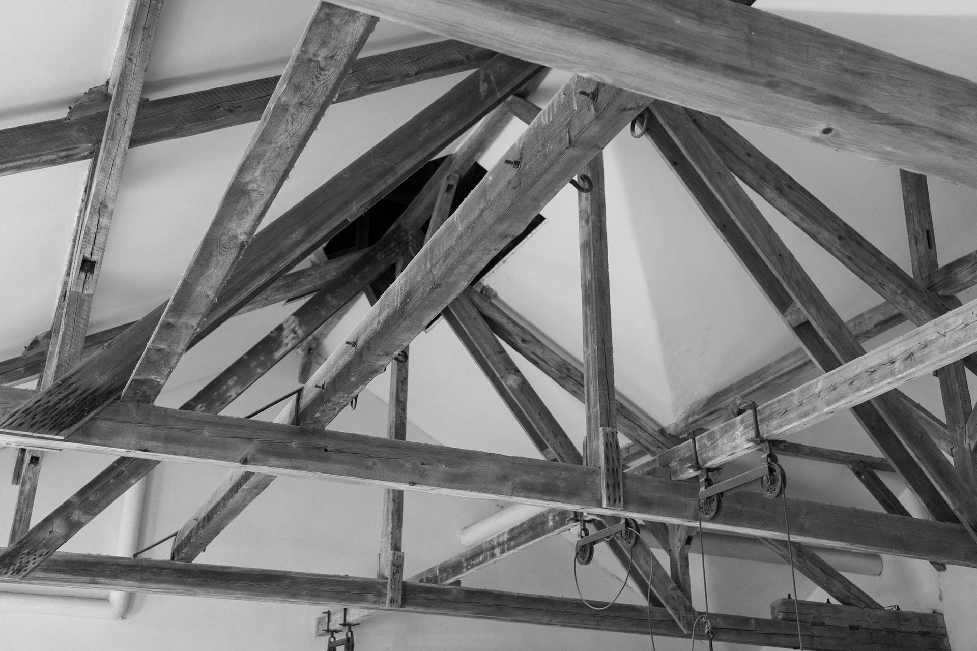 If you look closely at the wooden beams, you can see hooks. These were used for quick hangings of prisoners.