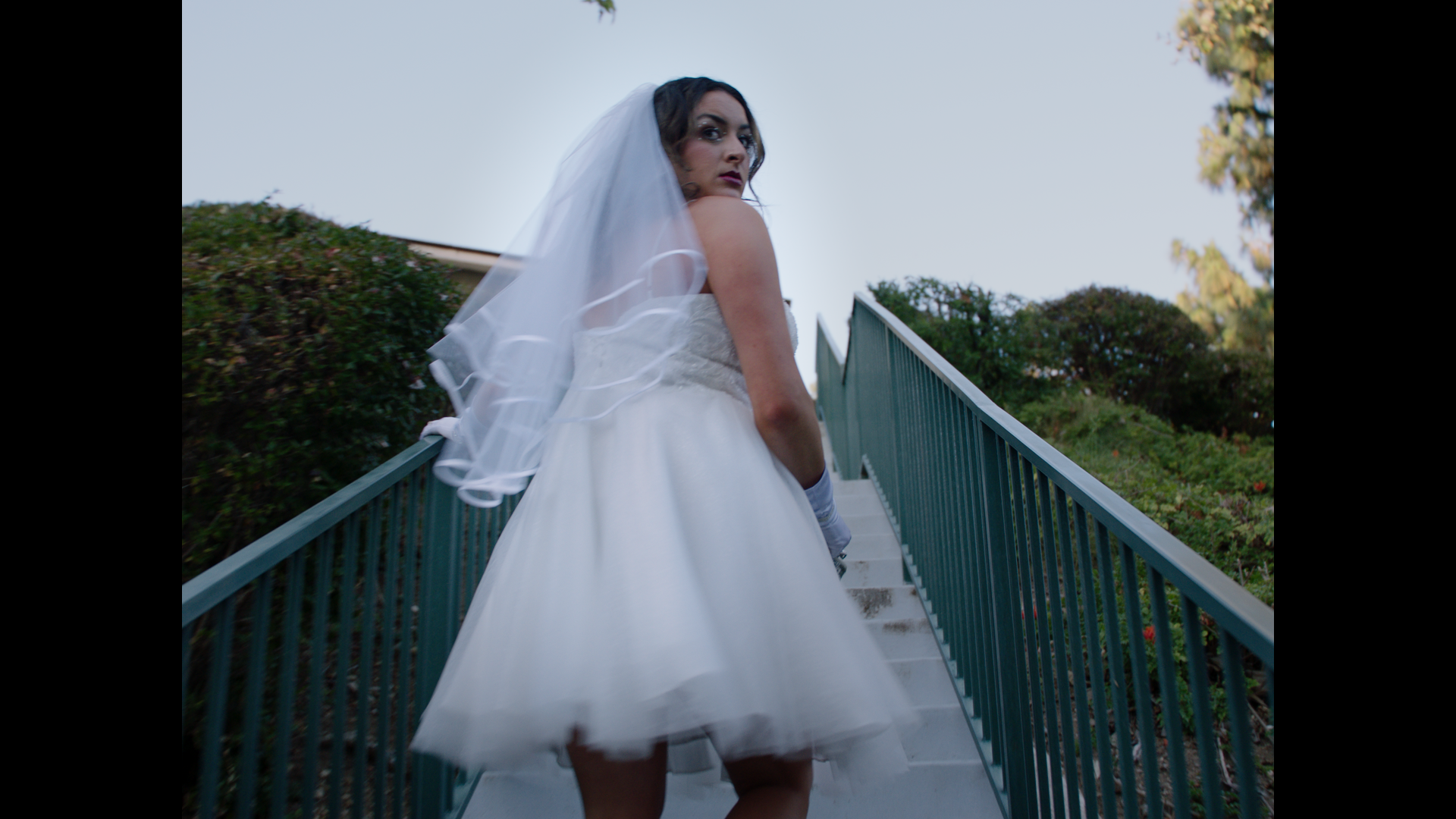 Still from Love Bomb Music Video