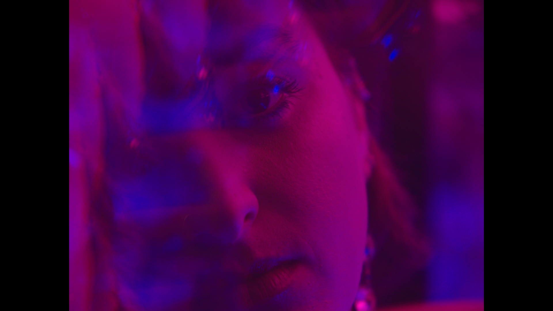 Still from Love Bomb Music Video