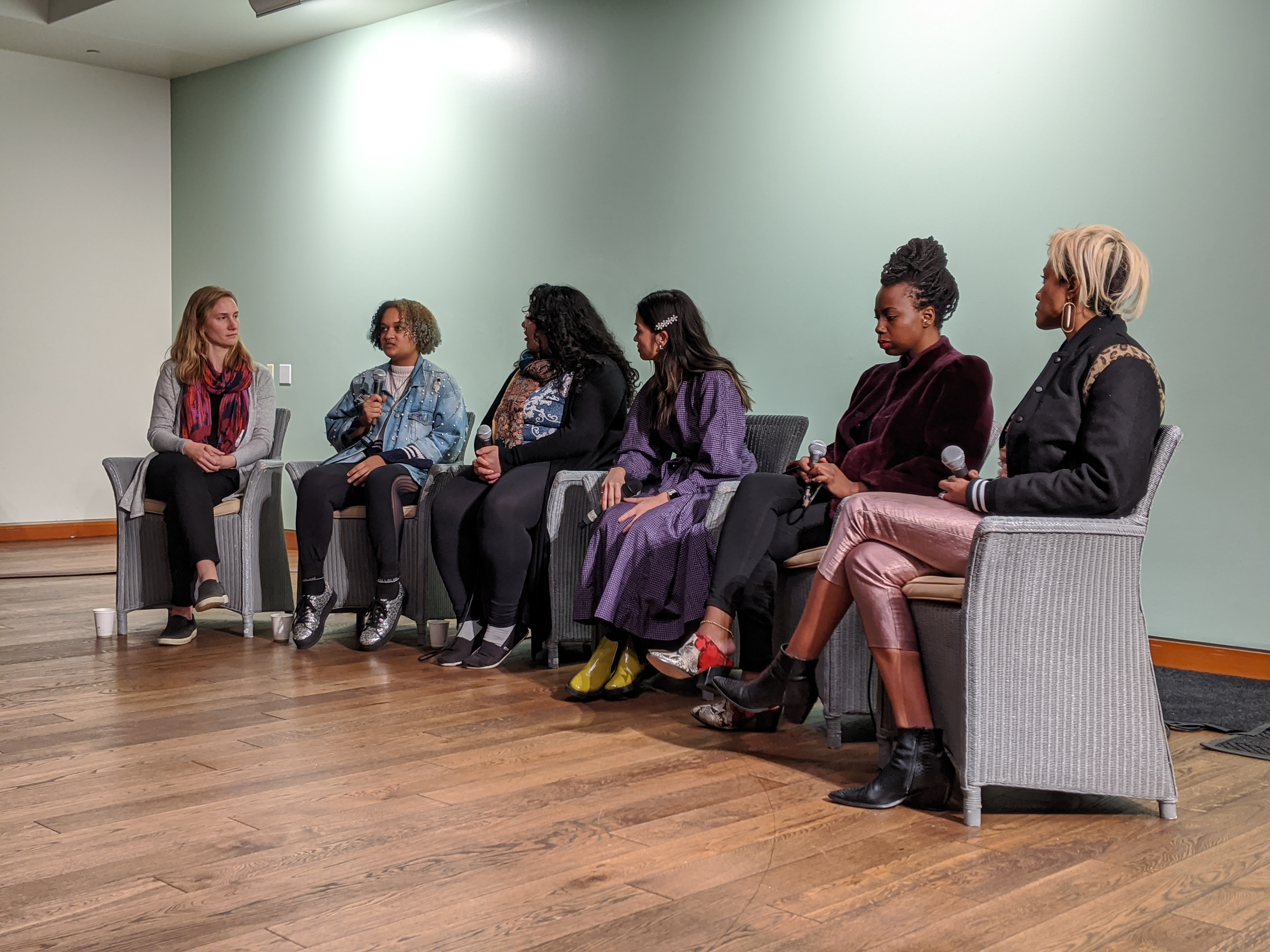 Opening Night Panel with featured Outside Looking In Artist. (From Left to Right: Sarah Boehmke, Healing Arts Director at Safe Place for Youth (SPY), Erika H., featured artist from SPY, Darla P., featured artist from SPY, Puno, Moderator, Arlene Rose, featured subject, Jasmine Monet Davis, featured photographer