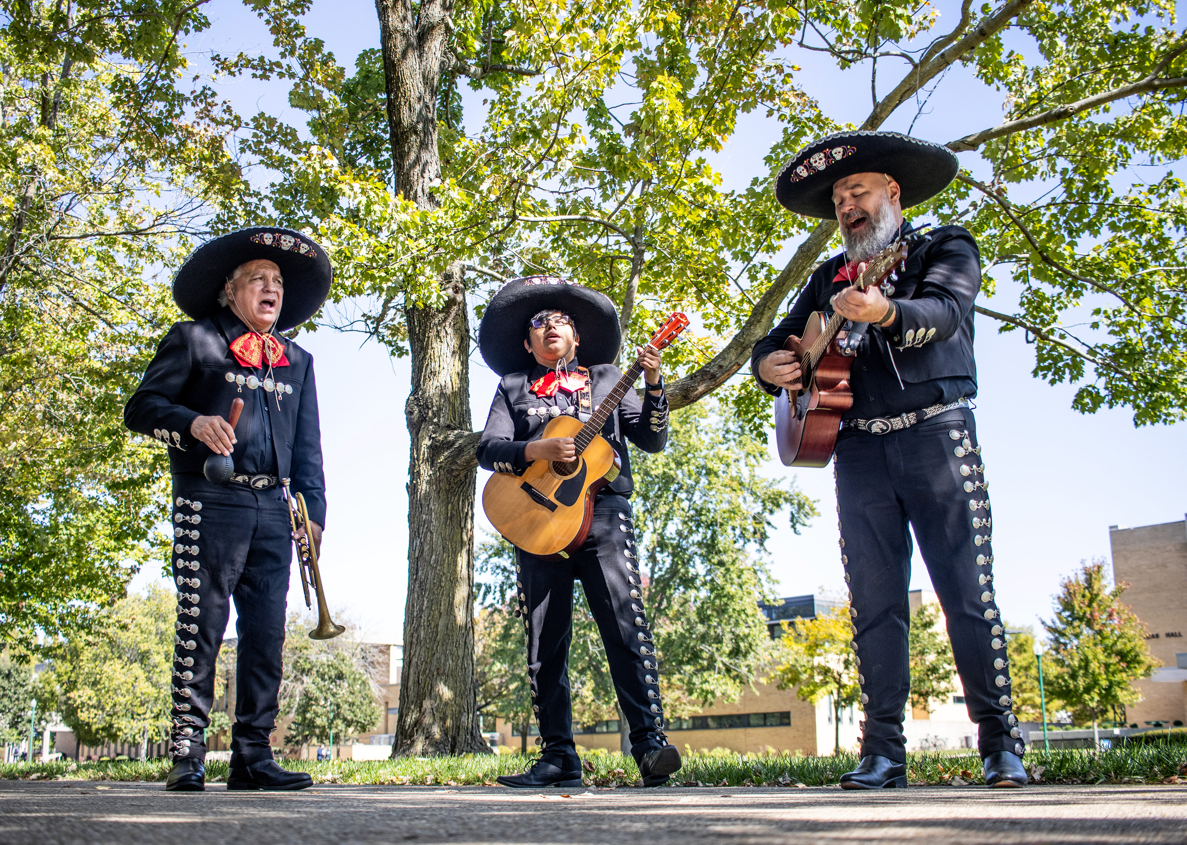 The Mariachi band, Los Amigos, walk around campus playing their instruments and singing multiple songs during Hispanic Heritage Month. Los Amigos have been playing for 13 years and have played in every state in the Southeast.