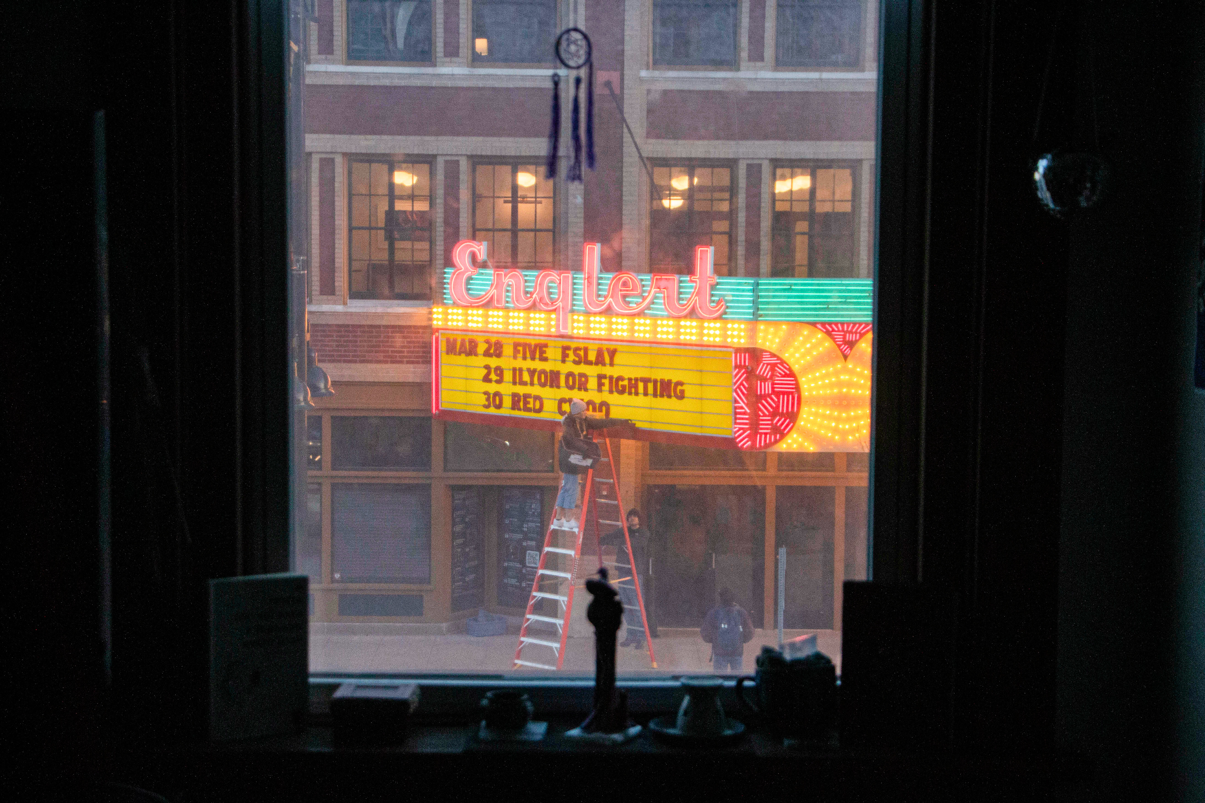 The lights of Enqlert Therater from my apartmet's window on March 27, 2024, Downtown Iowa City, IA.