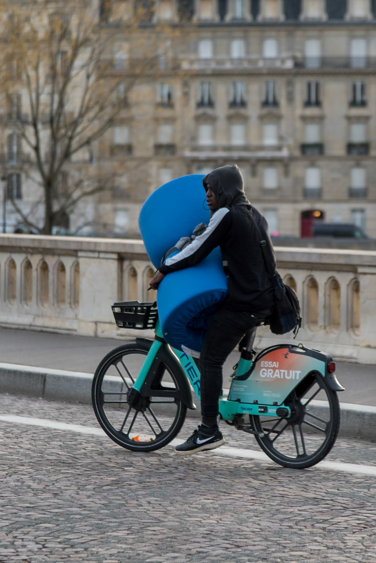 A homeless person is seeking a new place to sleep after being asked to leave the banks of the Seine. Paris, April 3, 2024.