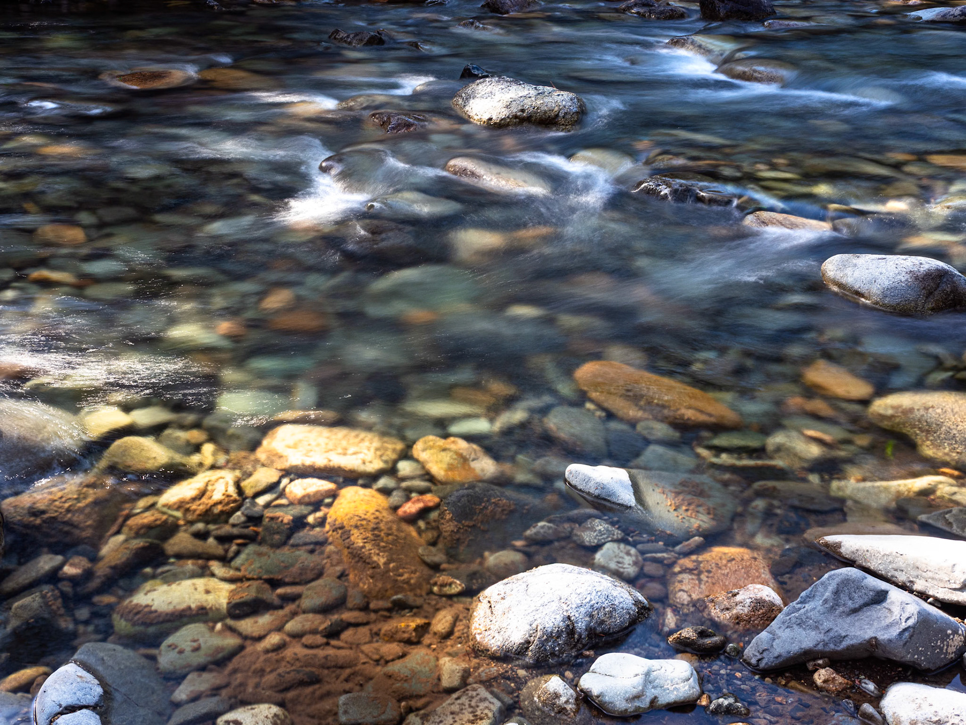 Creek Long Exposure with Colorful Rocks