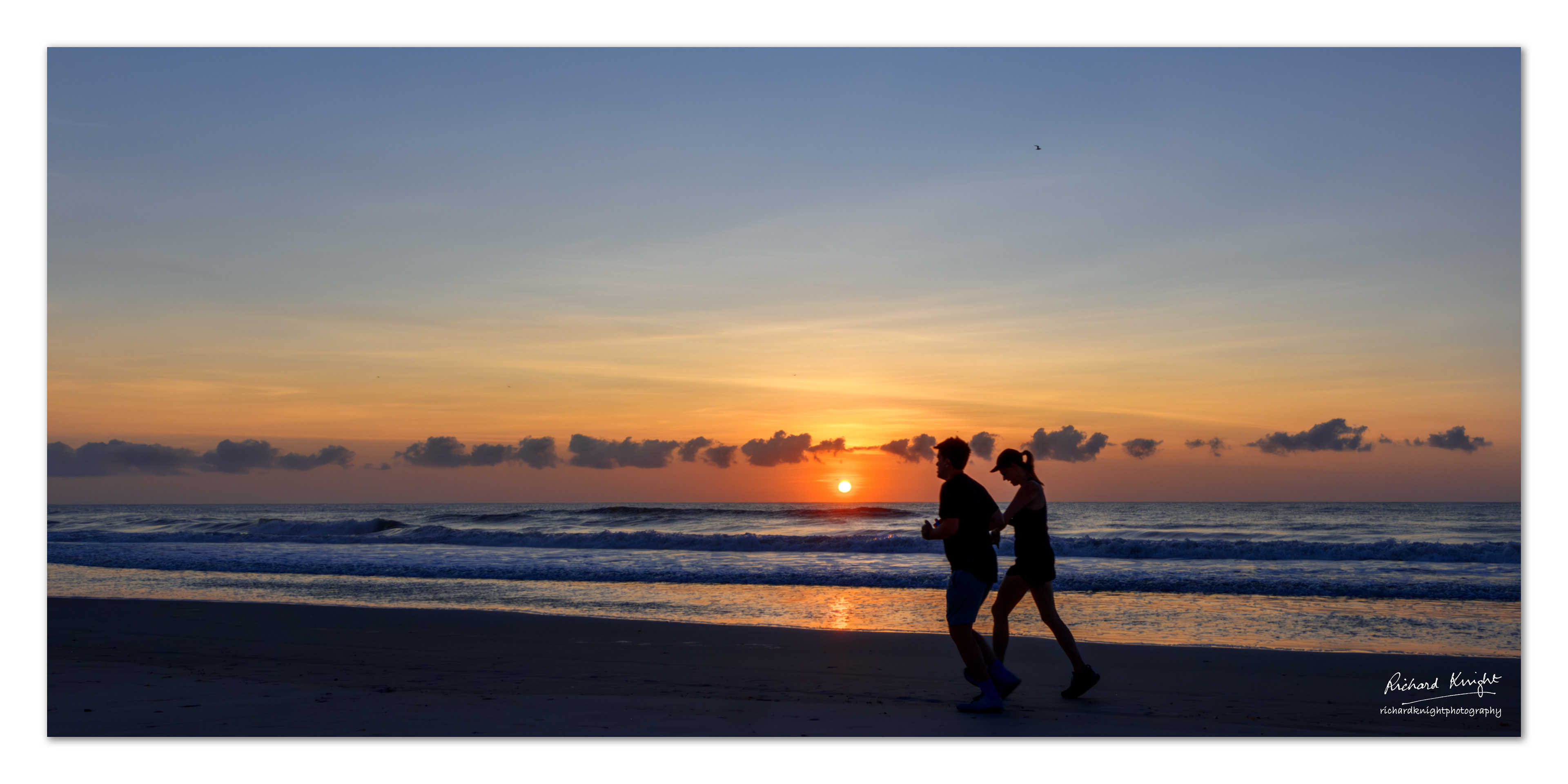 Early morning jog on the beach