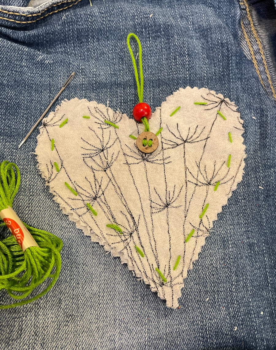 hand stitched heart + button