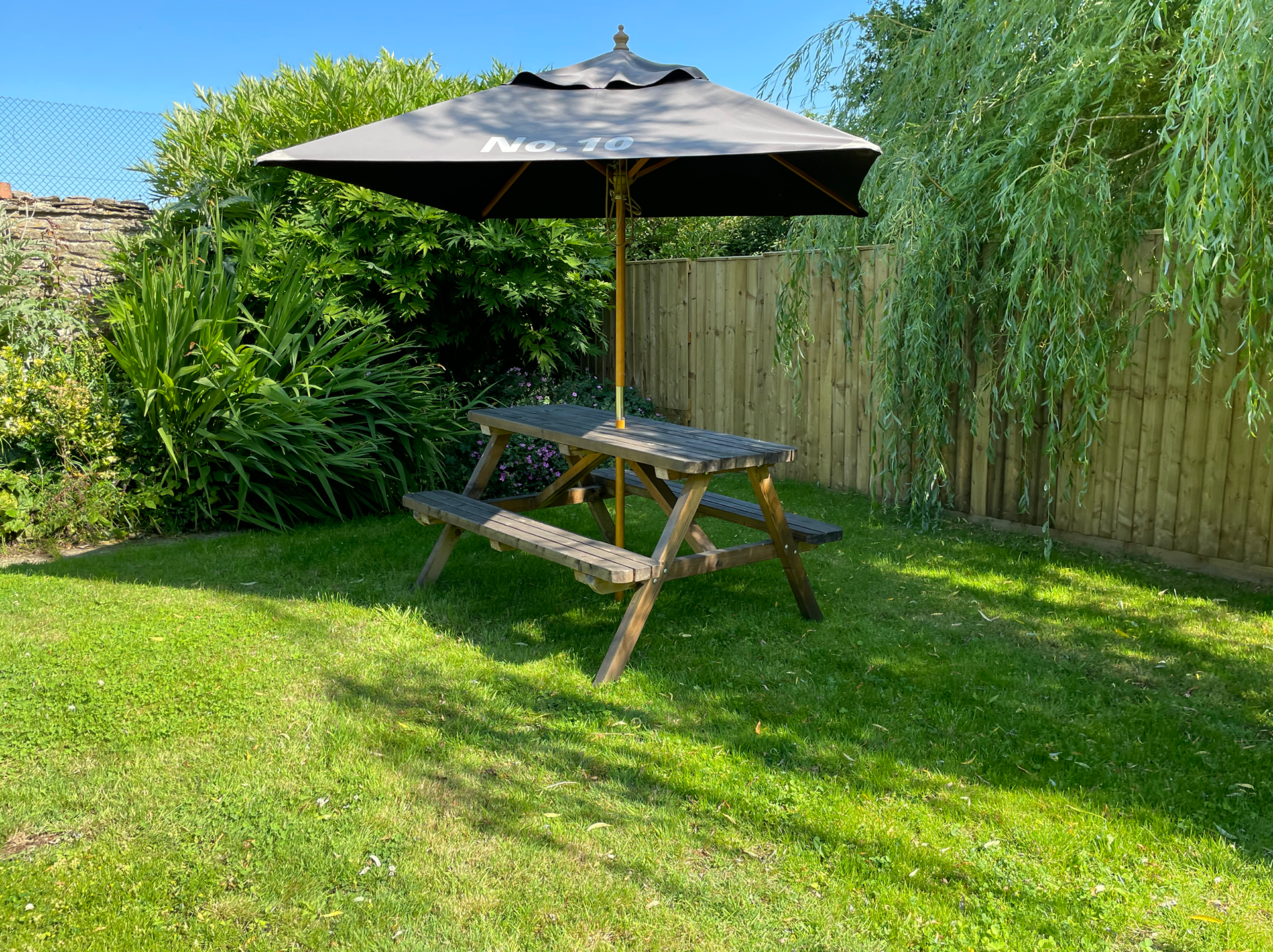 Private south facing garden with BBQ