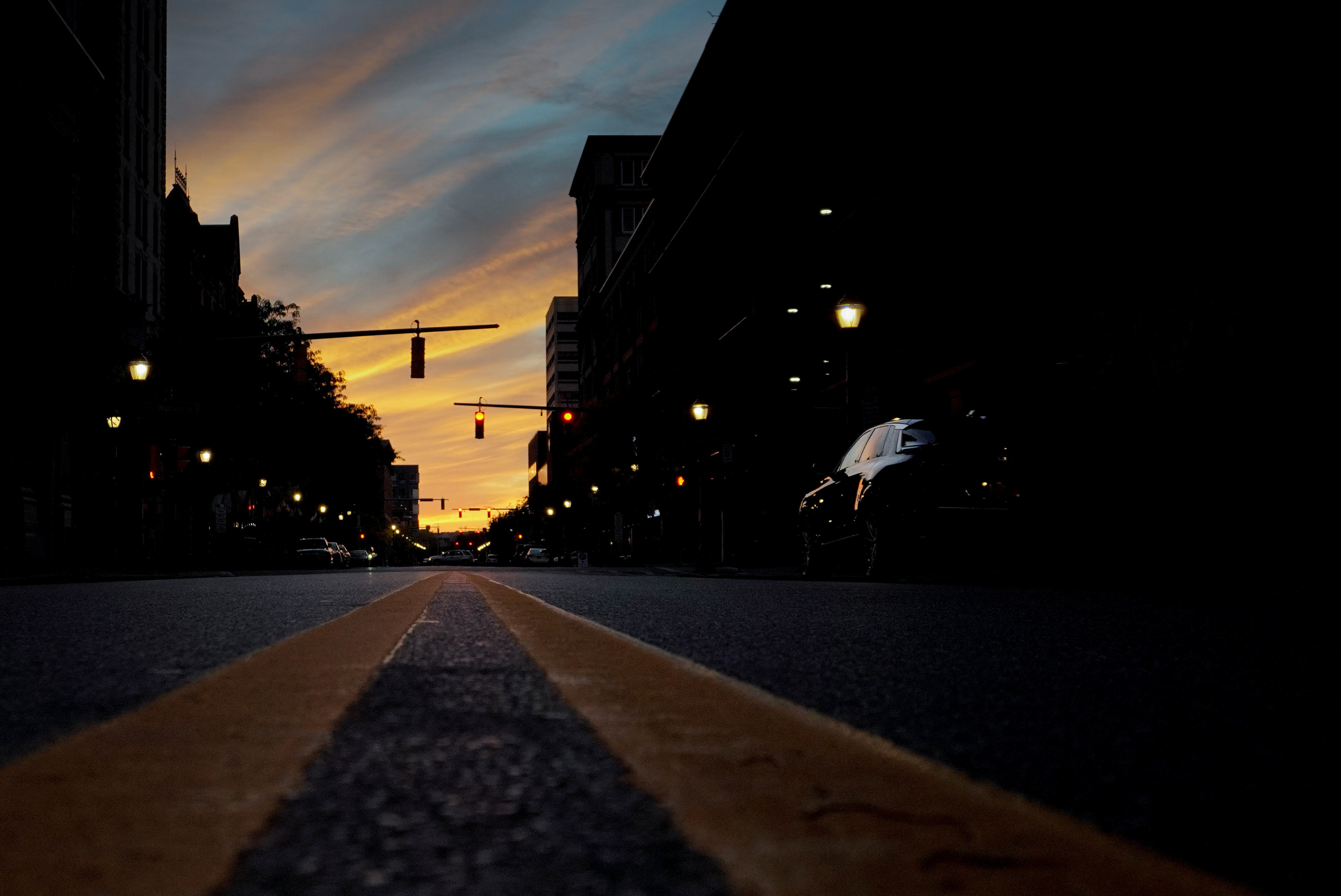 The sun sets over downtown Syracuse.