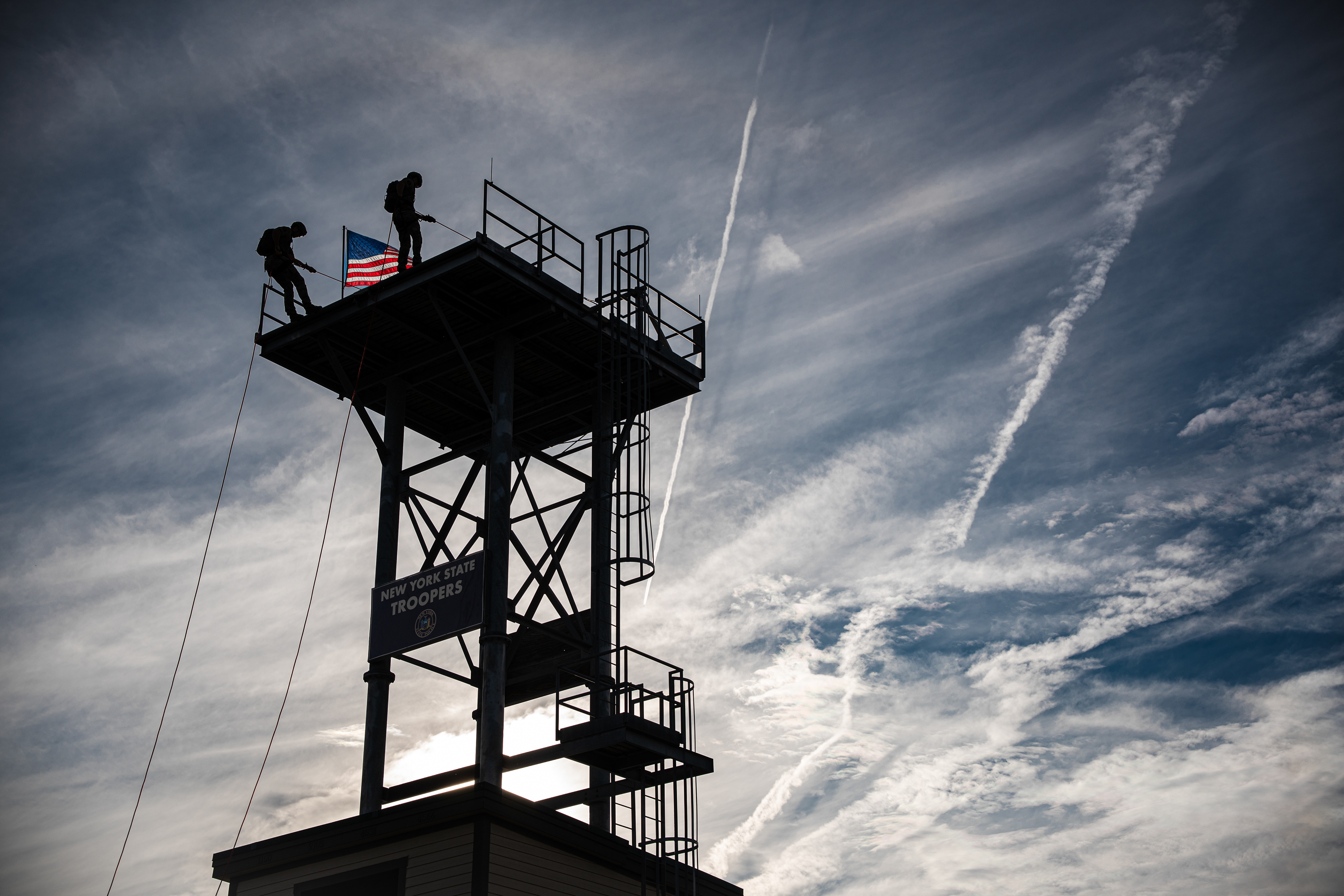 New York State Police demonstrate repelling down buildings during the Great New York State Fair.