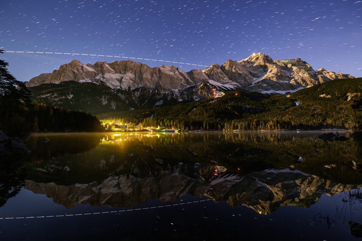 International Space Station transits over the Lake Eibsee and Mount Zugspitze, the highest peak in Germany.