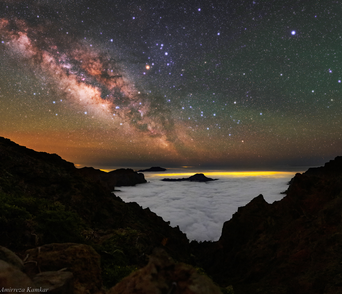 Milky Way over the cloud-filled caldera in La Palma, Canary Islands.