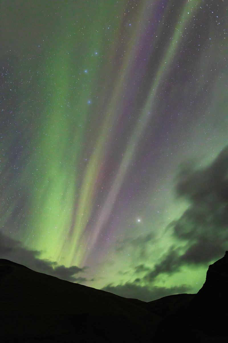Northern lights and bright star ASrcturus as seen from southern Iceland.