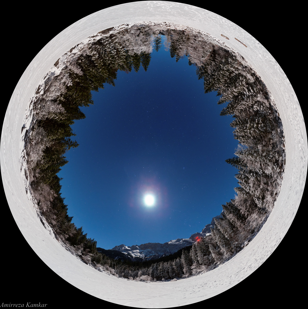 360-degree fulldome image of a moonlit night over a frozen lake in Bavaria.