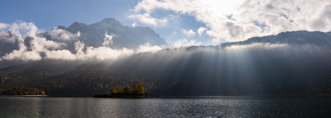 Sun rays through clouds in Lake Eibsee.