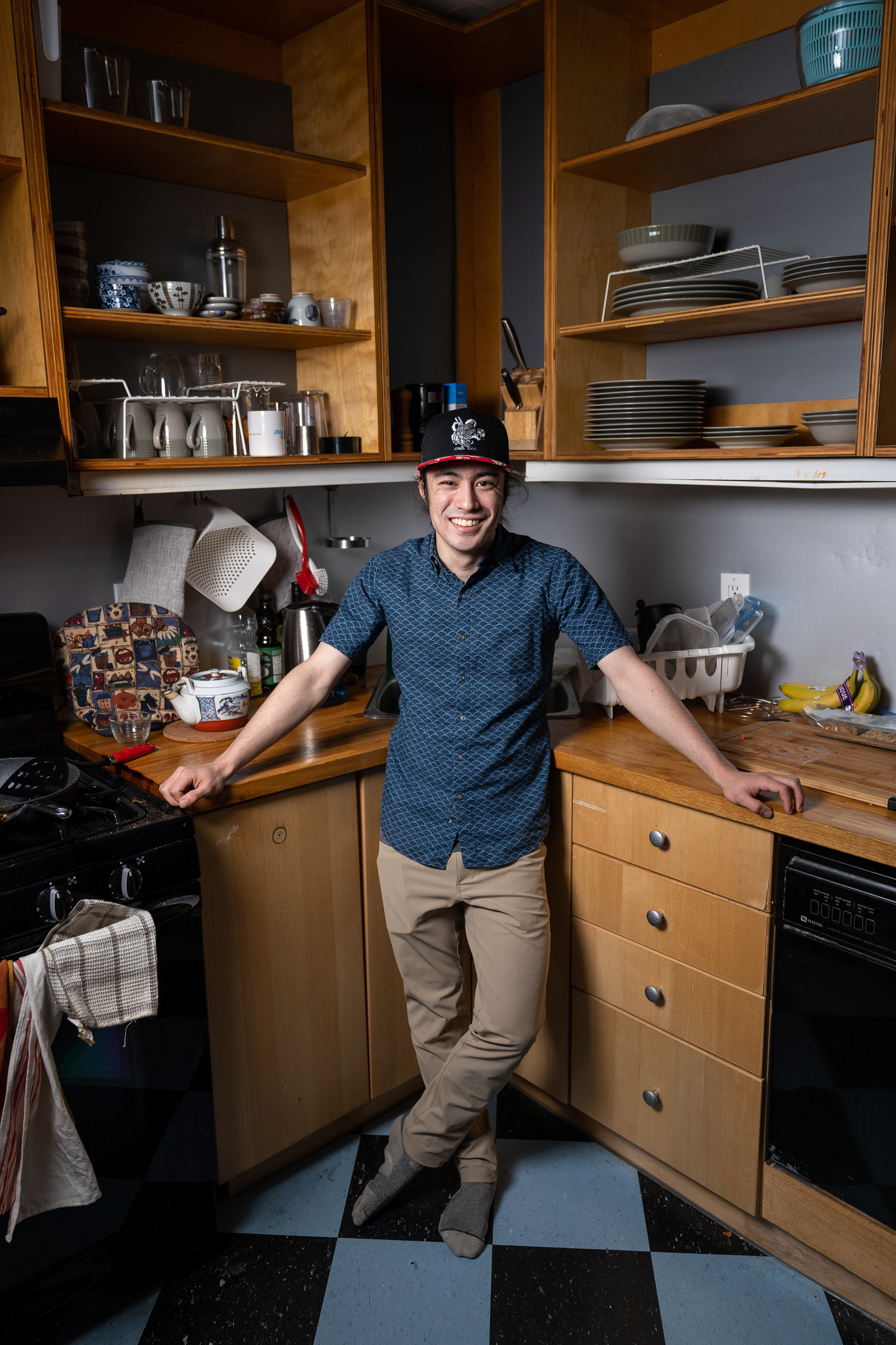 Ottawa, Ont.—Alex Okuda-Rayfuse, 27, stands inside the kitchen of his recently purchased home in Centretown. Last fall, he said he purchased the rowhouse due to its location, charm and aesthetic. “Call me old-fashioned but this house reminds me of old Montreal or the places I saw growing up,” he said. Born and raised in Ottawa, he noted that he enjoys the city for its small-town vibe, yet he said it remains large enough to be “relevant.”