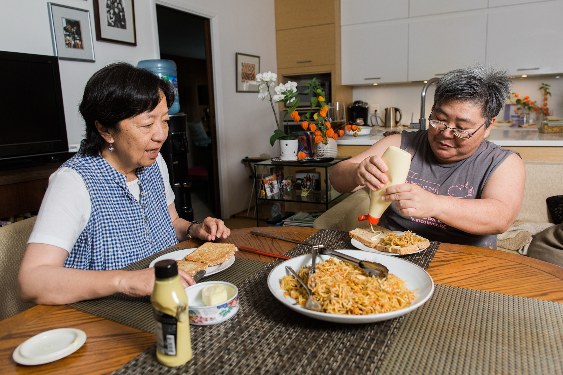 New Westminster, B.C.—A firefighter candidate enters an empty house in the Sapperton area of New Westminster as part of the city’s firefighter and rescue training scenarios. Candidates removed props from the house, cleared smoked and hosed the house from the outside and inside. The house, soon to be demolished, was granted use from the city. Photo by Kayla Isomura