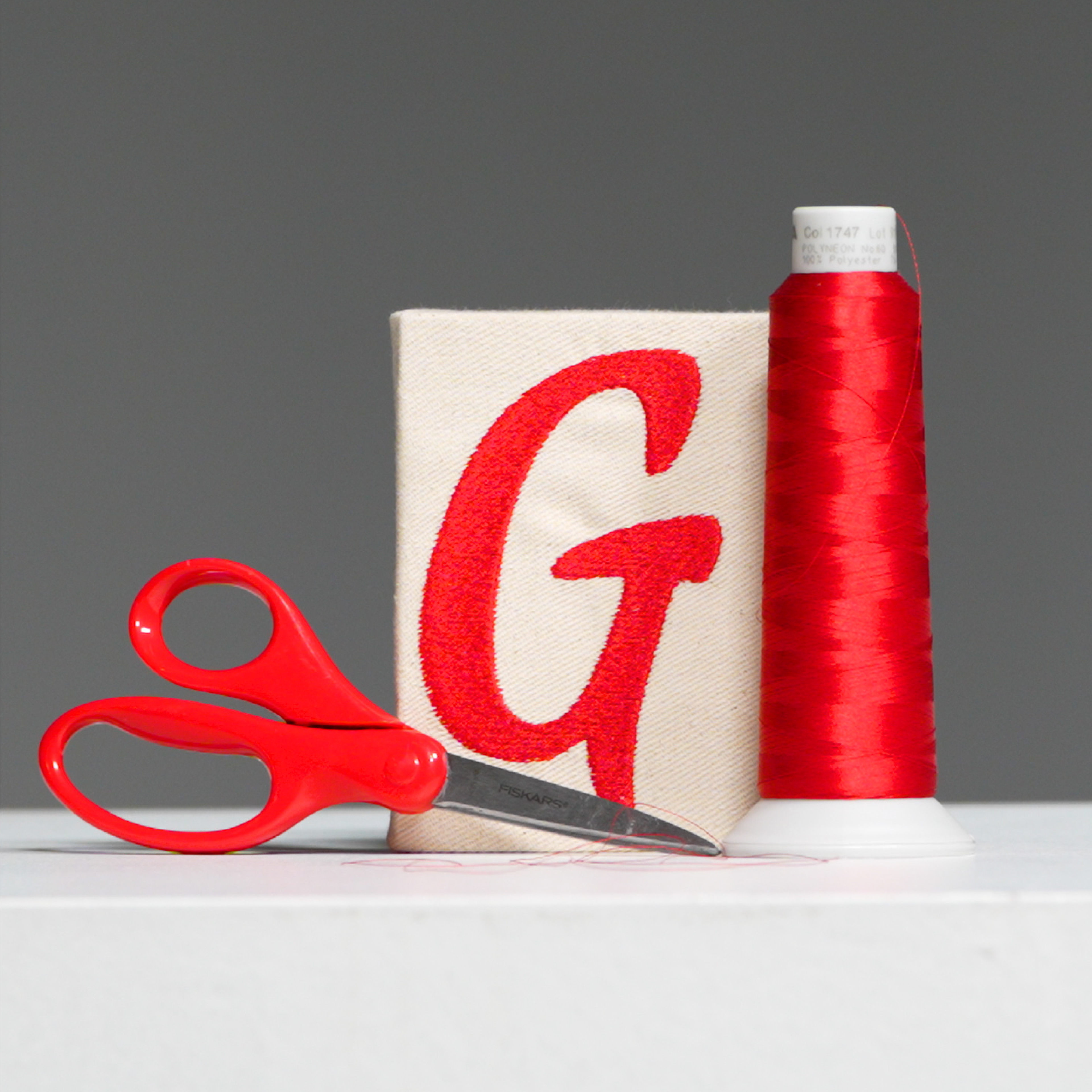 Embroidered G