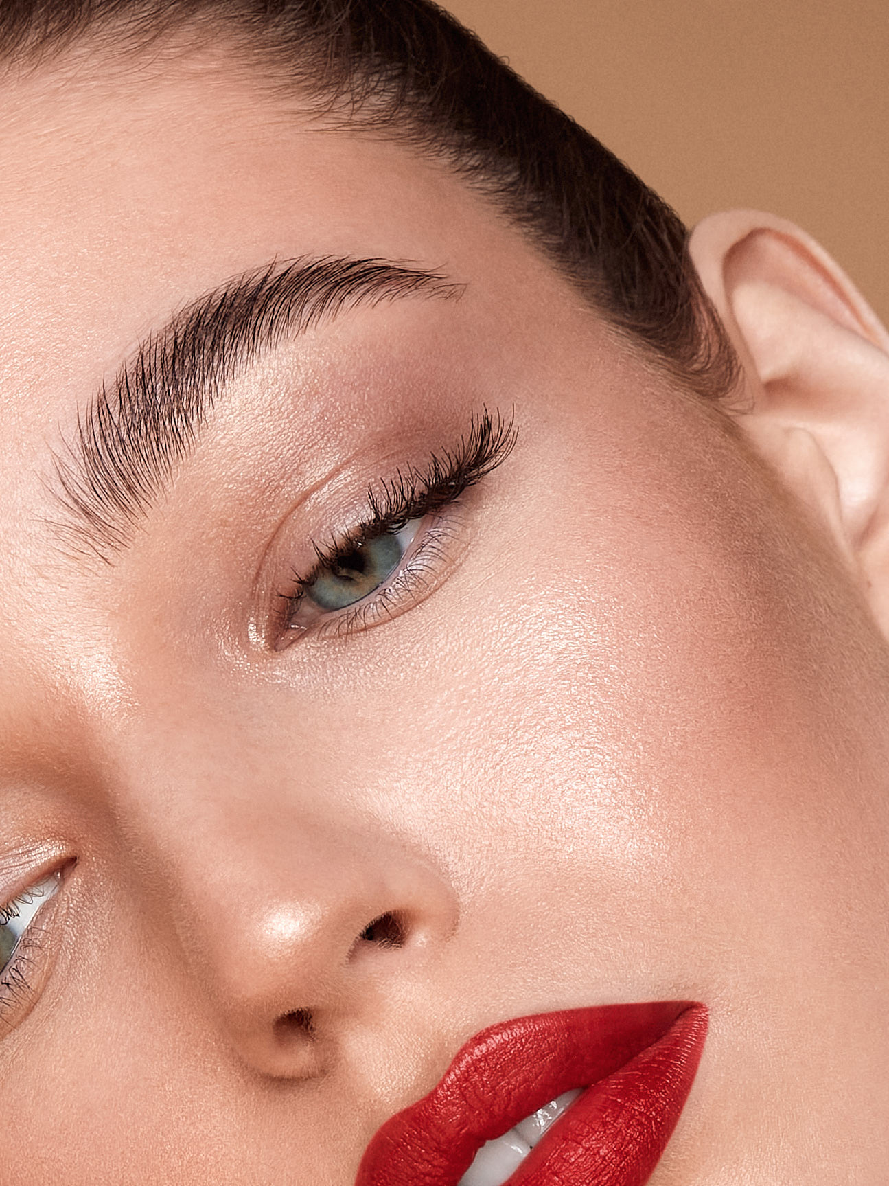 Before and after example of high-quality portrait photo retouching by The Retouching Agency