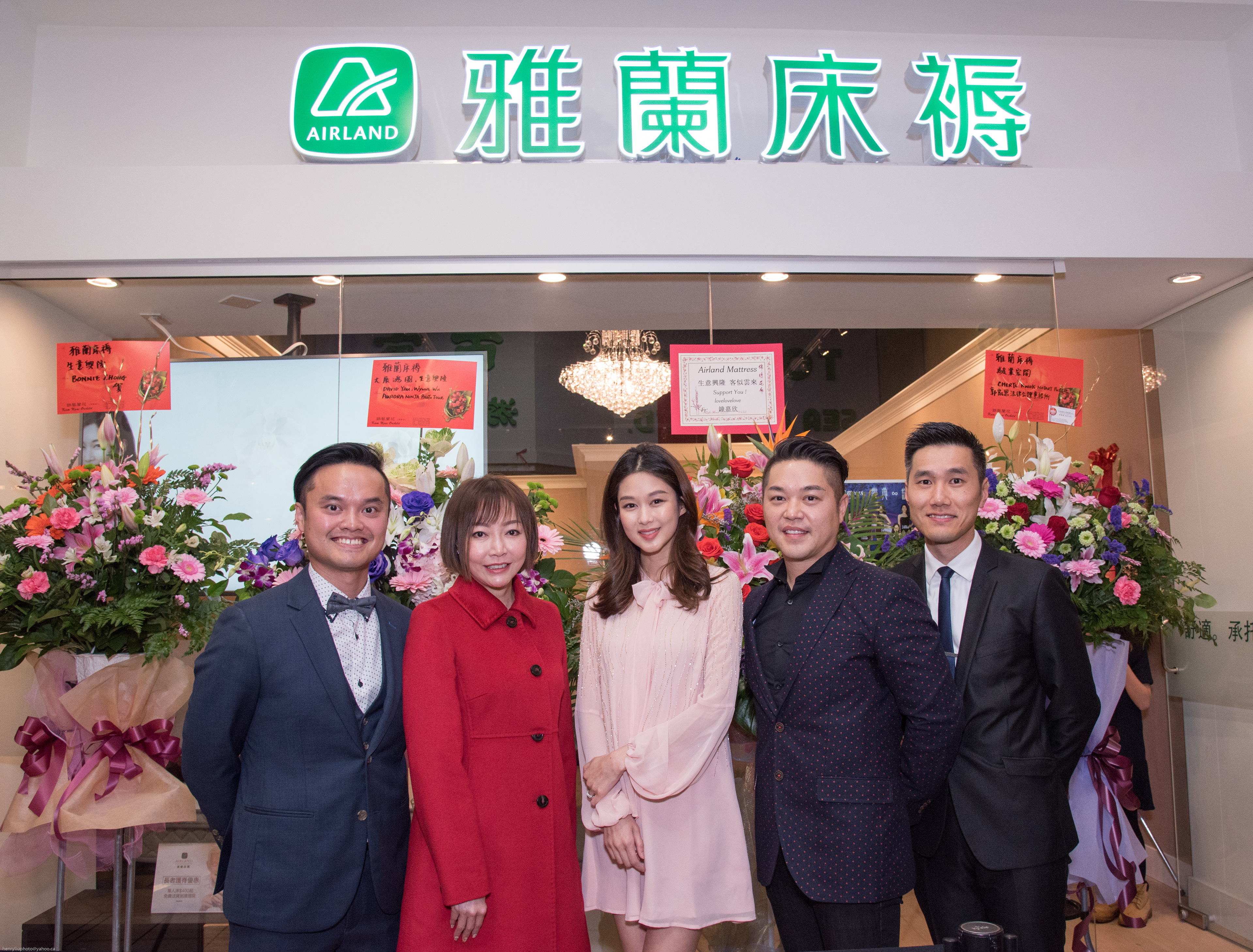 Group photo with Eliza Sam in front of Airland Mattress' second location in Vancouver